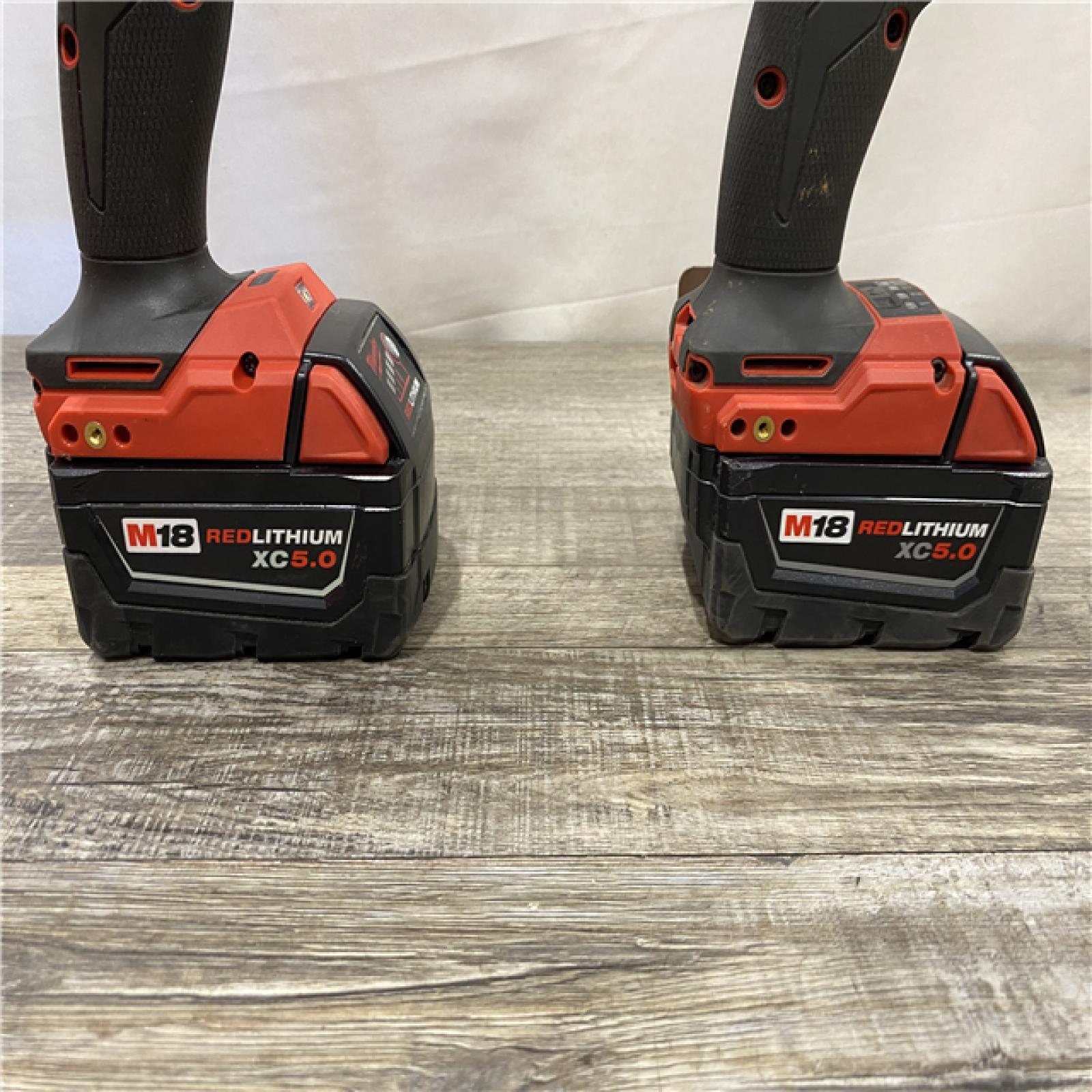 AS-IS Milwaukee FUEL 18V Lithium-Ion Brushless Cordless Hammer Drill and Impact Driver Combo Kit