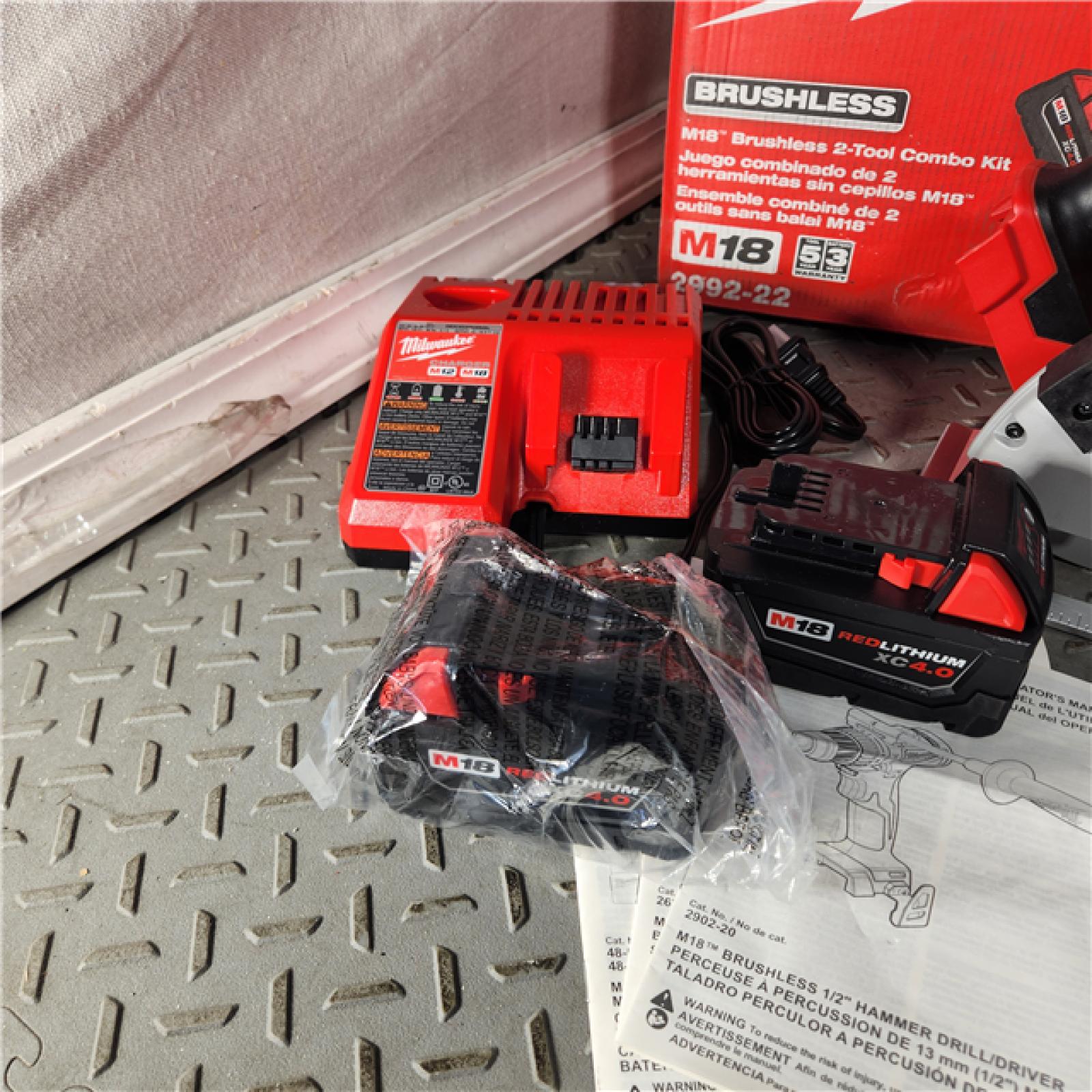 Houston Location - As-Is Milwaukee 2992-22 18V M18 Lithium-Ion Brushless Cordless 2-Tool Combo Kit with 1/2 Hammer Drill/Driver and 7-1/4 Circular Saw 4.0 Ah - Appears IN NEW Condition
