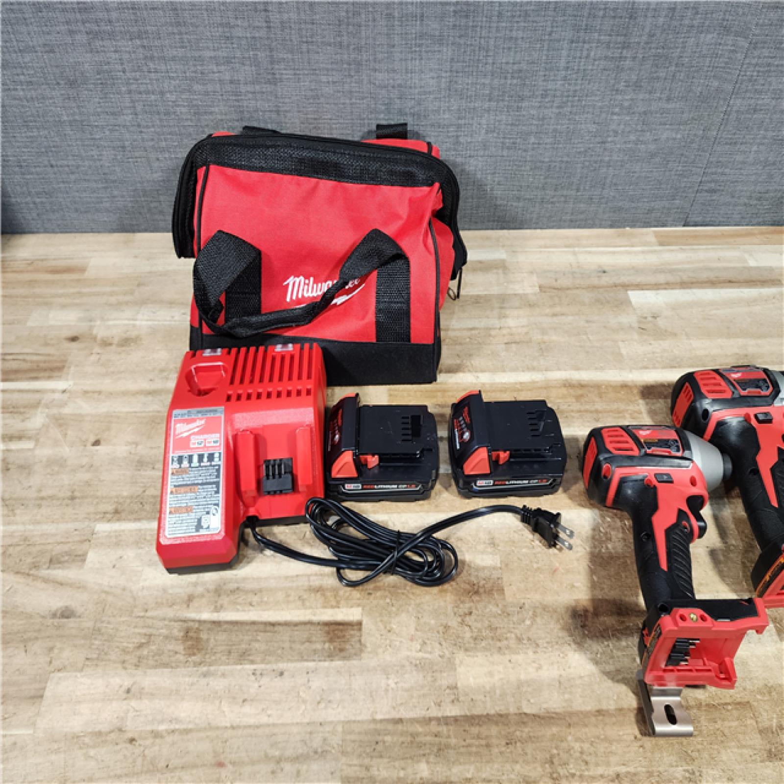 HOUSTON LOCATION - AS - IS Milwaukee 18V Lithium-Ion Cordless Drill Driver/Impact Driver Combo Kit