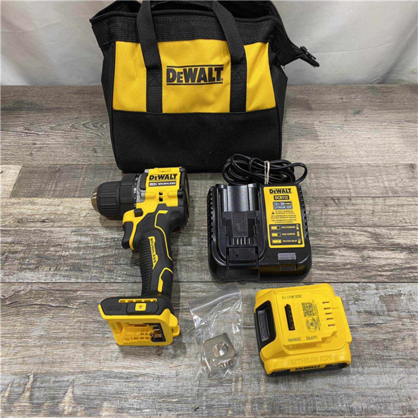 AS-IS DEWALT Atomic 20V Max Lithium-Ion Brushless Cordless Compact 1/4 in. Impact Driver Kit