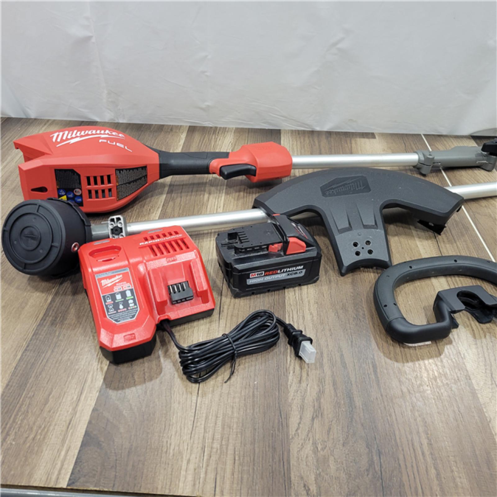 AS-IS MILWAUKEE  M18 FUEL 18V 16 in. Brushless Cordless Battery Powered String Trimmer W/QUIK-LOK Attachment Capability & 8.0 Ah Battery