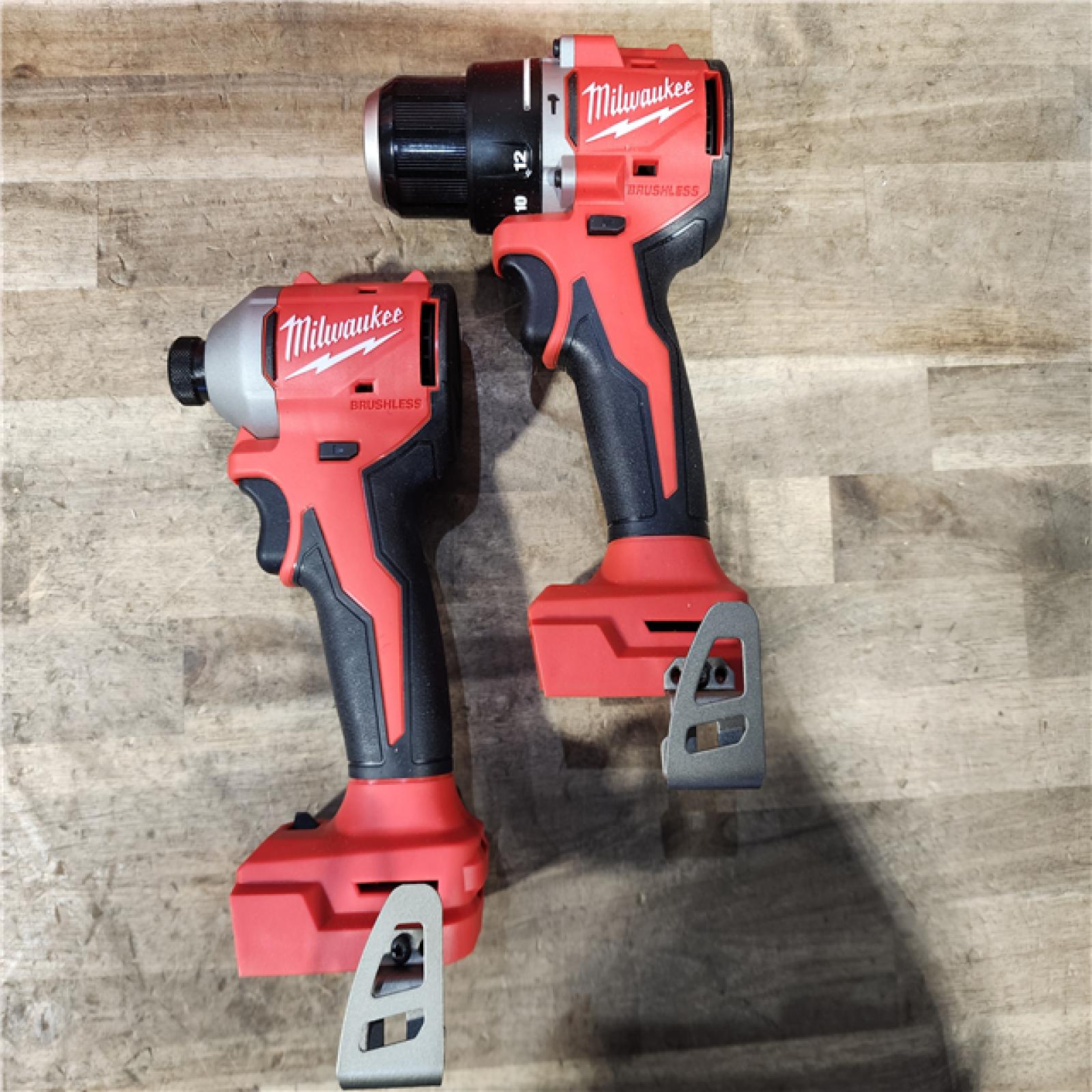 HOUSTON LOCATION - AS-IS M18 18-Volt Lithium-Ion Brushless Cordless Compact Hammer Drill/Impact Combo Kit (2-Tool) with (2) Batteries  Bag