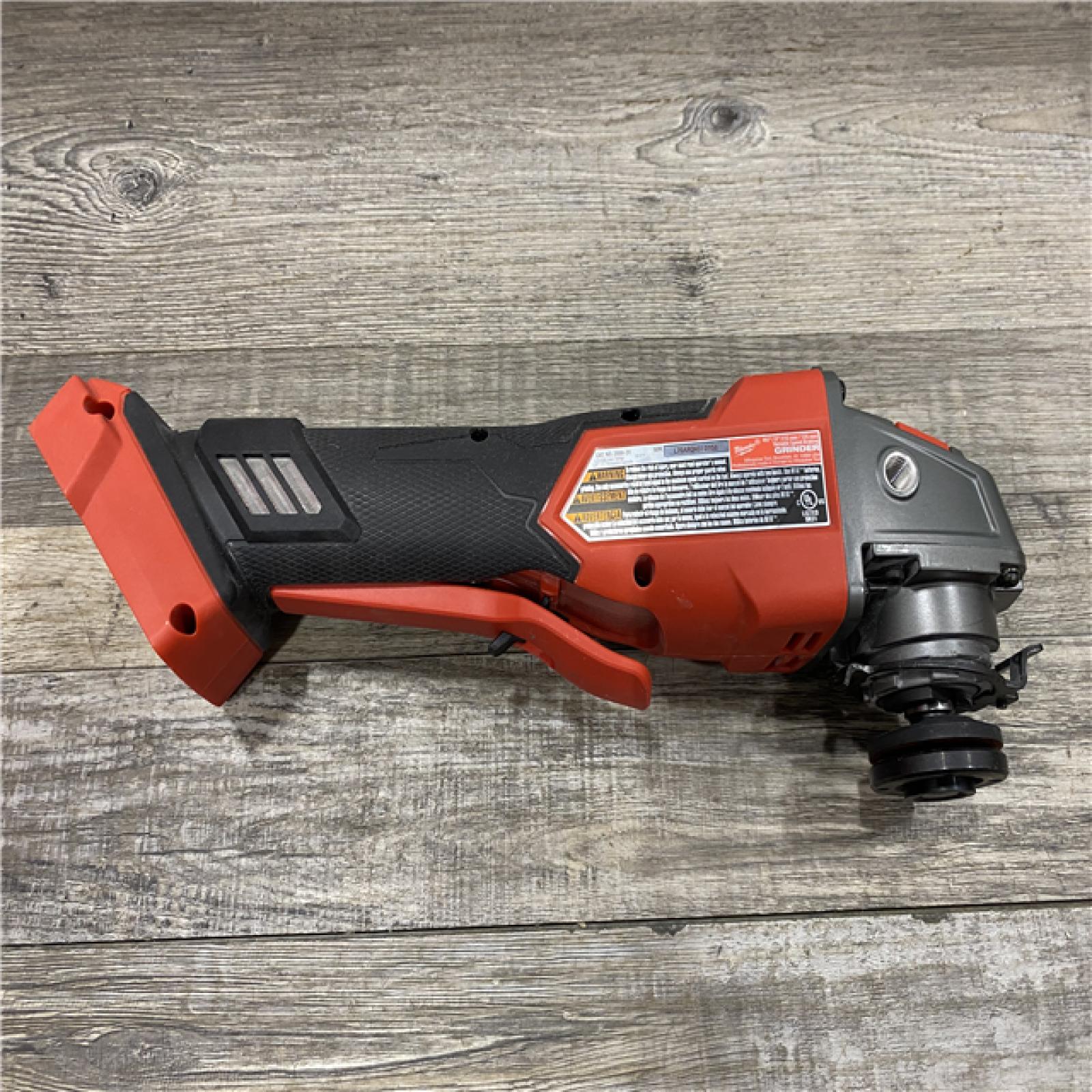 AS-IS Milwaukee FUEL 18V Lithium-Ion Brushless Cordless 4-1/2 in./5 in. Grinder with Variable Speed & Paddle Switch (Tool-Only)