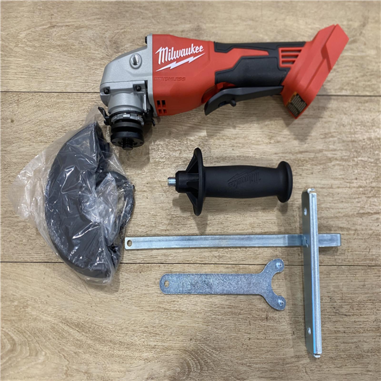 AS-IS Milwaukee 18V Lithium-Ion Brushless Cordless 4-1/2 in./5 in. Grinder w/Paddle Switch (Tool-Only)