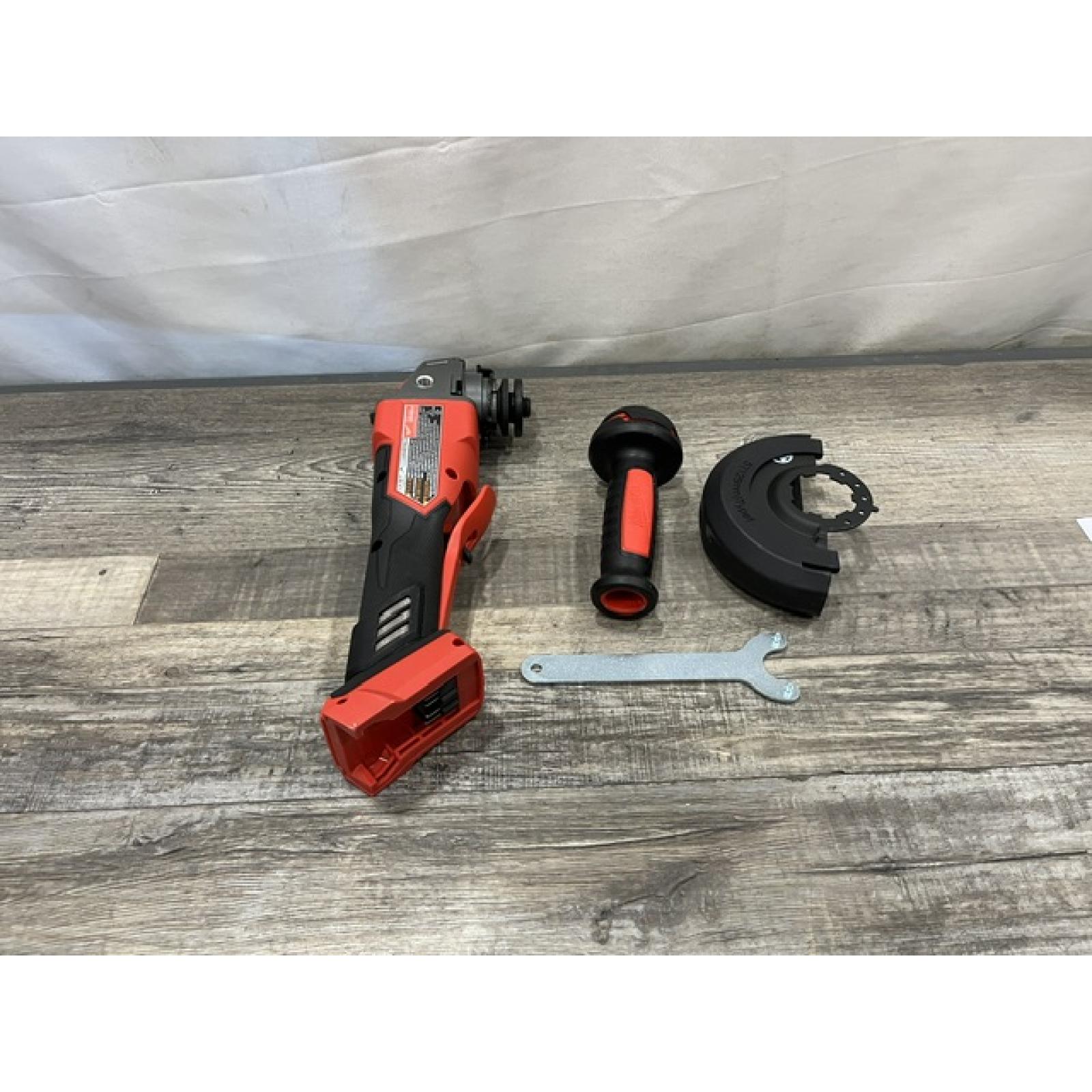 AS-IS Milwaukee FUEL 18V Lithium-Ion Brushless Cordless 4-1/2 in./5 in. Grinder w/Paddle Switch (Tool-Only)