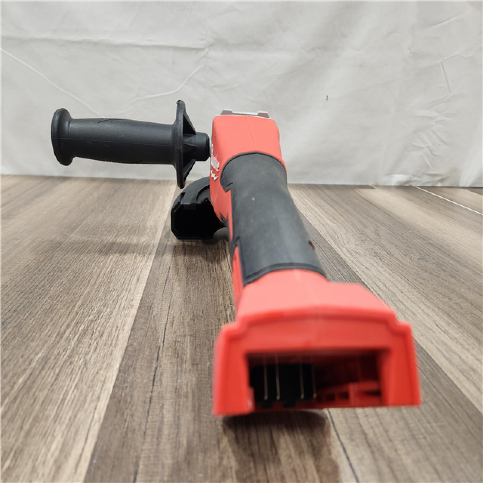 AS-IS- Milwaukee18V Cordless 4.5 /5  Grinder W/ Paddle Switch (Tool Only)