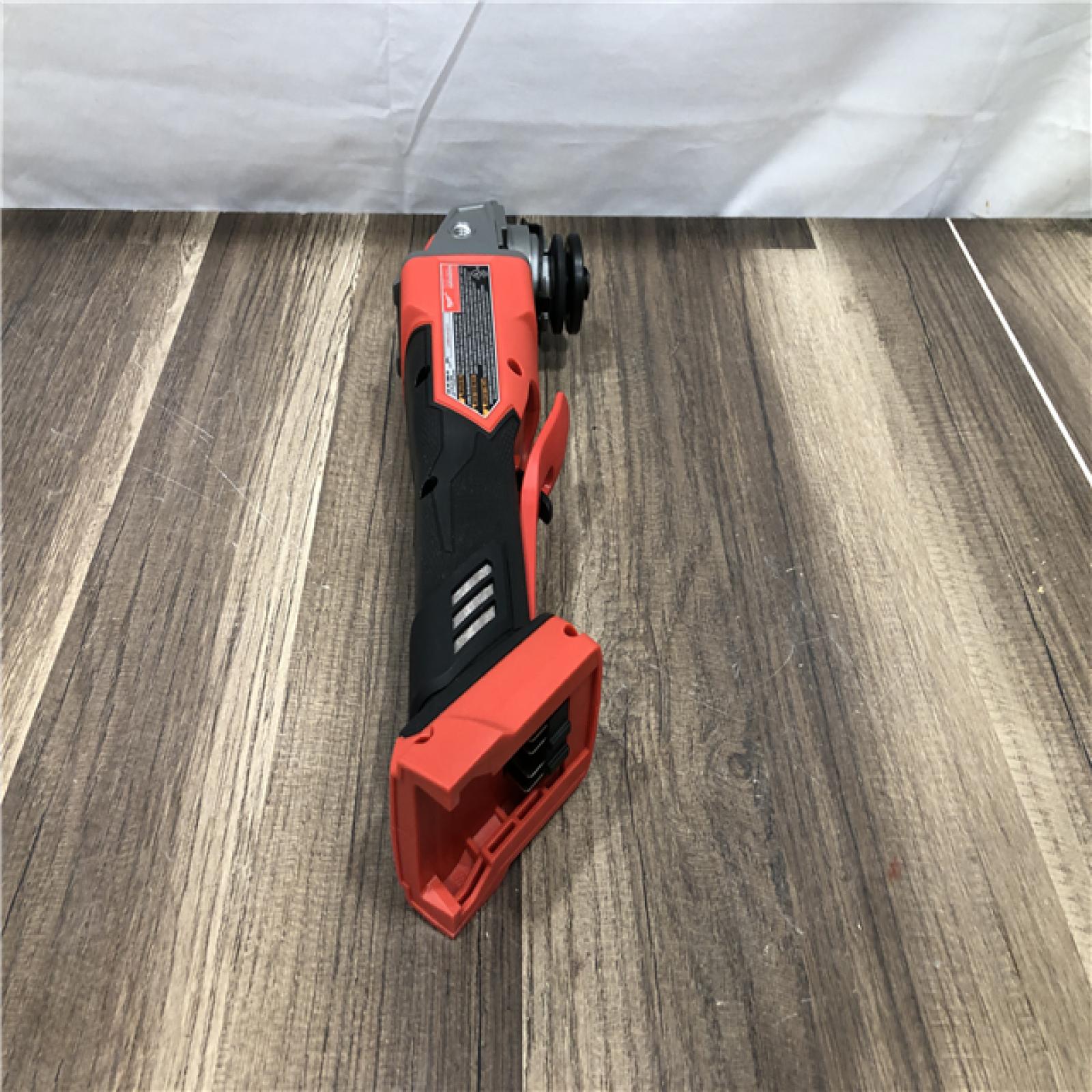 AS-IS Milwaukee FUEL 18V Lithium-Ion Brushless Cordless 4-1/2 in./5 in. Grinder w/Paddle Switch (Tool-Only)