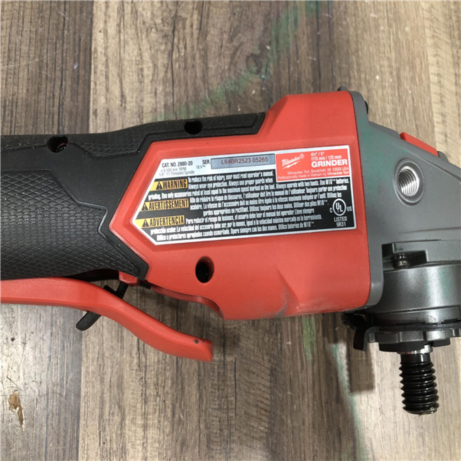 AS-IS Milwaukee FUEL 18V Lithium-Ion Brushless Cordless 4-1/2 in./5 in. Grinder w/Paddle Switch (Tool-Only)