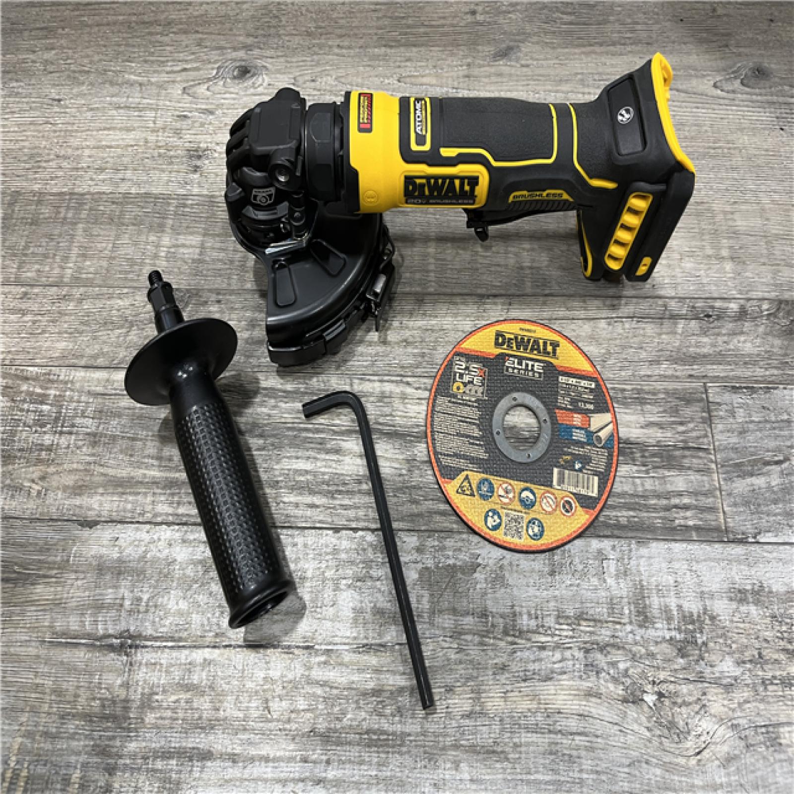 AS-IS DEWALT ATOMIC 20V MAX Cordless 4-1/2 in. Angle Grinder with Paddle Switch (Tool Only)