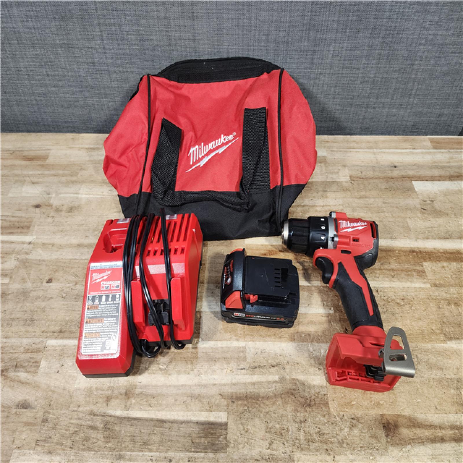 HOUSTON LOCATION - AS - IS Milwaukee 18V Lithium-Ion Brushless Cordless 1/2 in. Compact Drill/Driver with kit