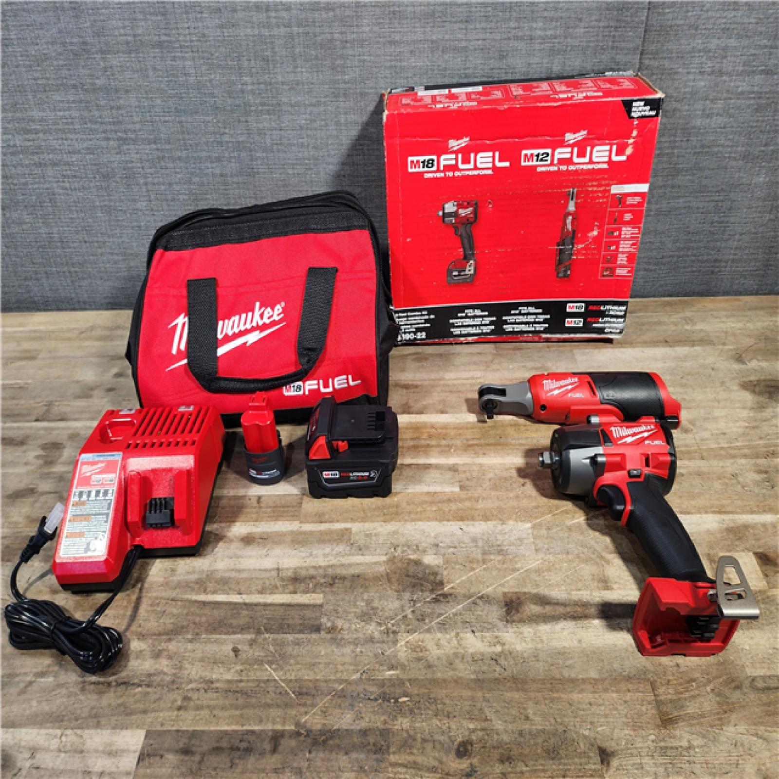 HOUSTON LOCATION - AS-IS (APPEARS LIKE NEW) M18 FUEL 18V Cordless Mid Torque 1/2 in. Impact Wrench W/ M12 FUEL 3/8 in. Ratchet & Battery/Charger Combo Kit