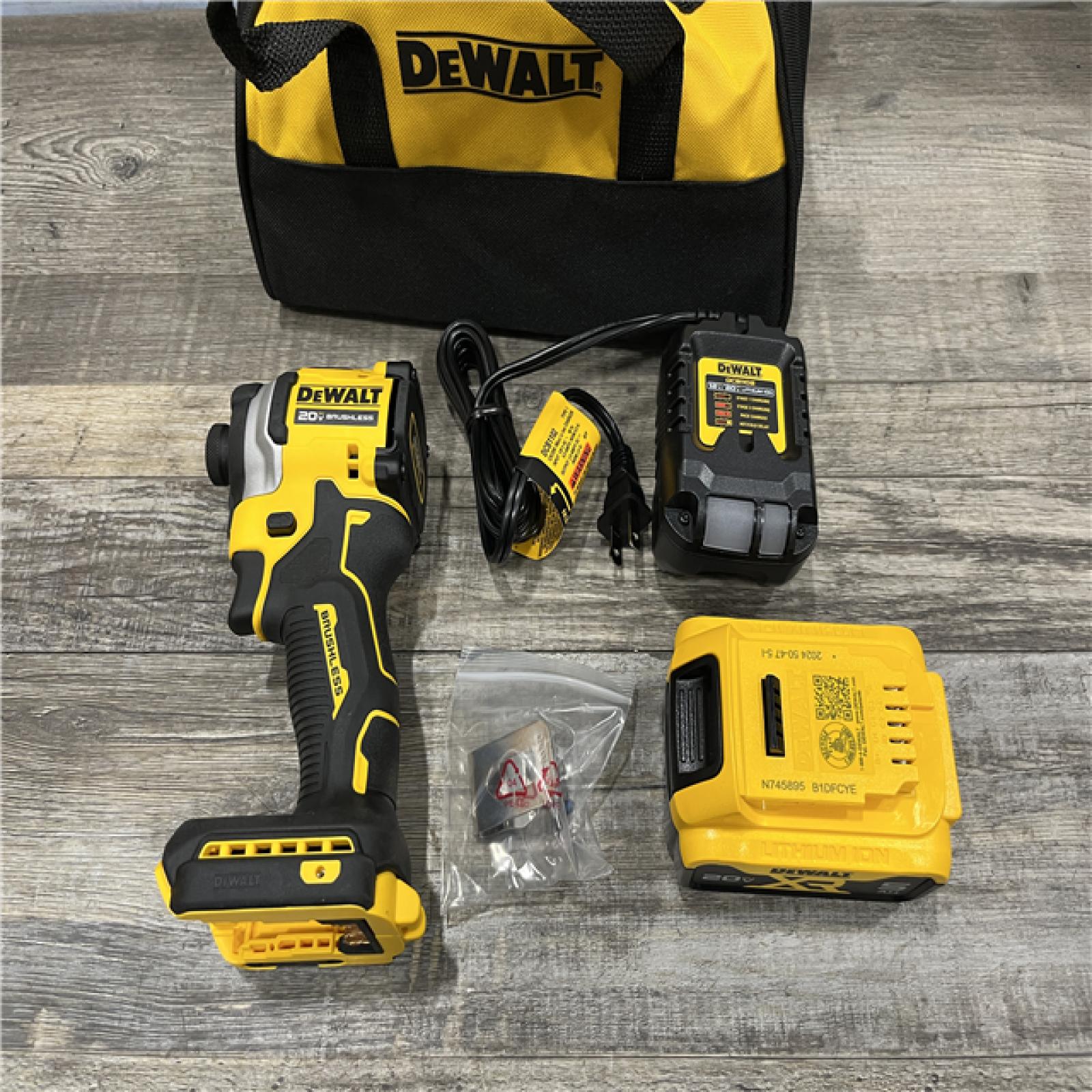 AS-IS DEWALT ATOMIC 20V MAX Lithium-Ion Cordless 1/4 in. Brushless Impact Driver Kit