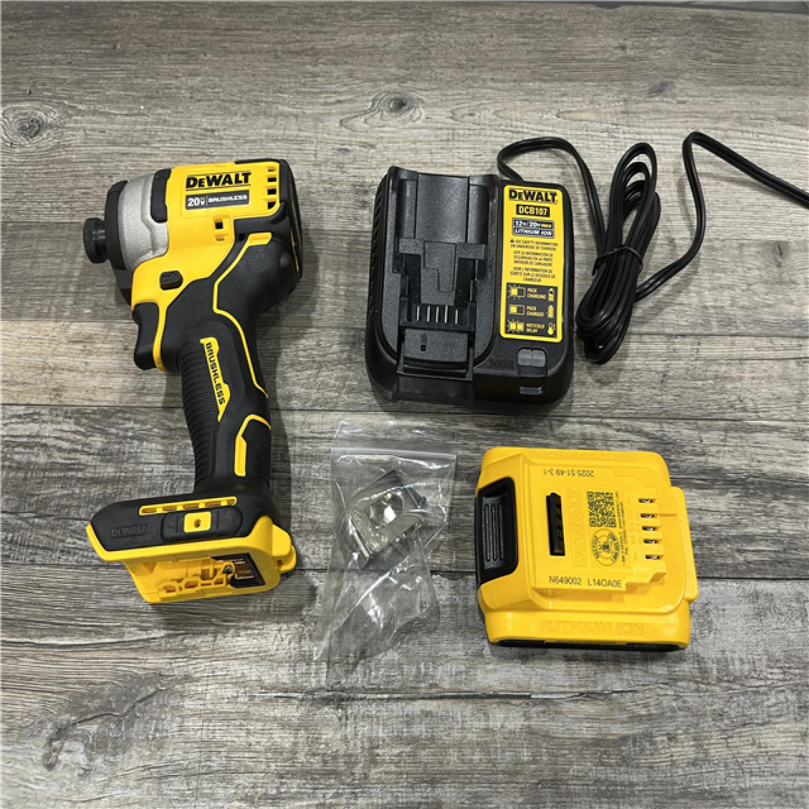AS-IS DEWALT Atomic 20V Max Lithium-Ion Brushless Cordless Compact 1/4 in. Impact Driver Kit