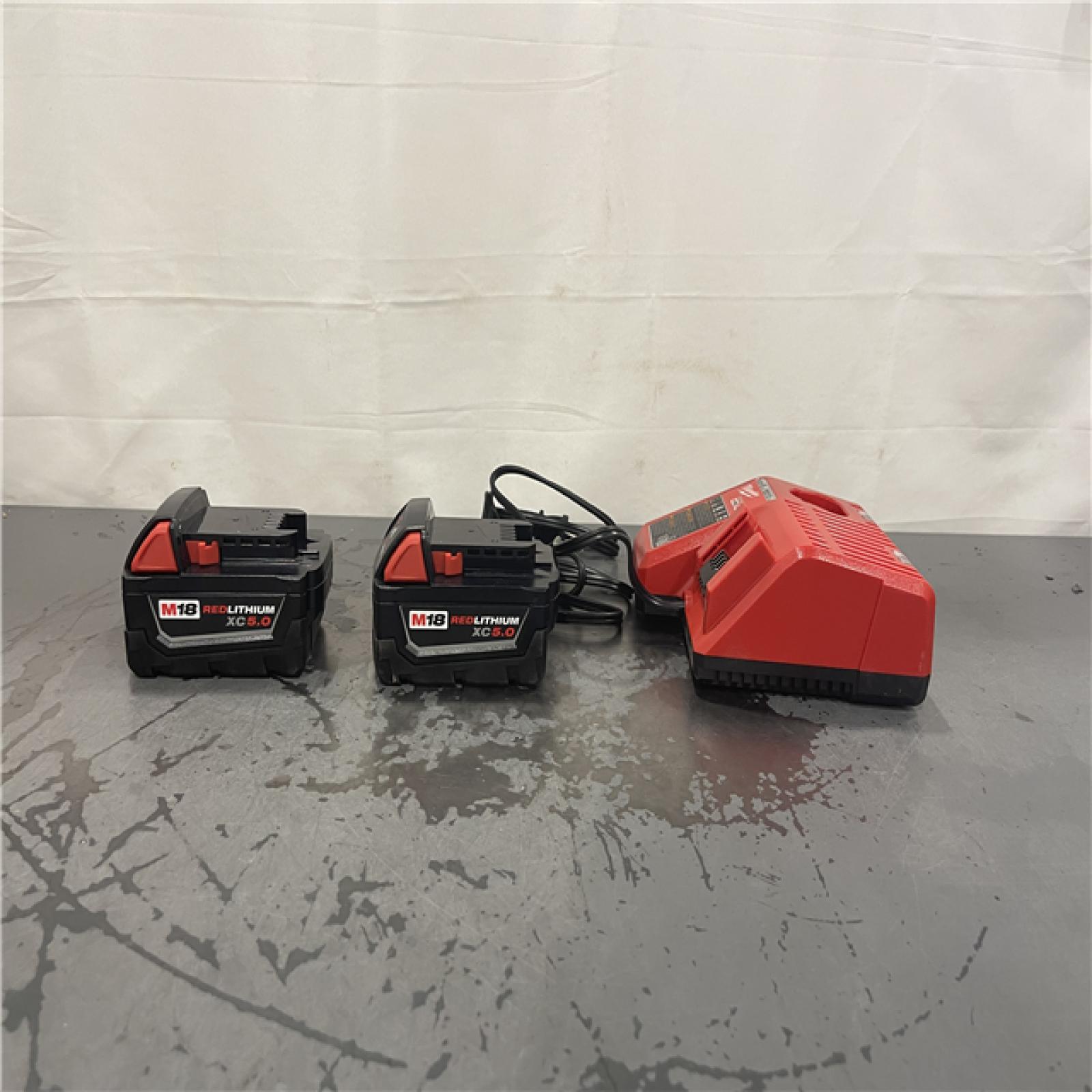 AS-IS- M18 18-Volt Lithium-Ion XC Starter Kit with Two 5.0Ah Batteries and Charger