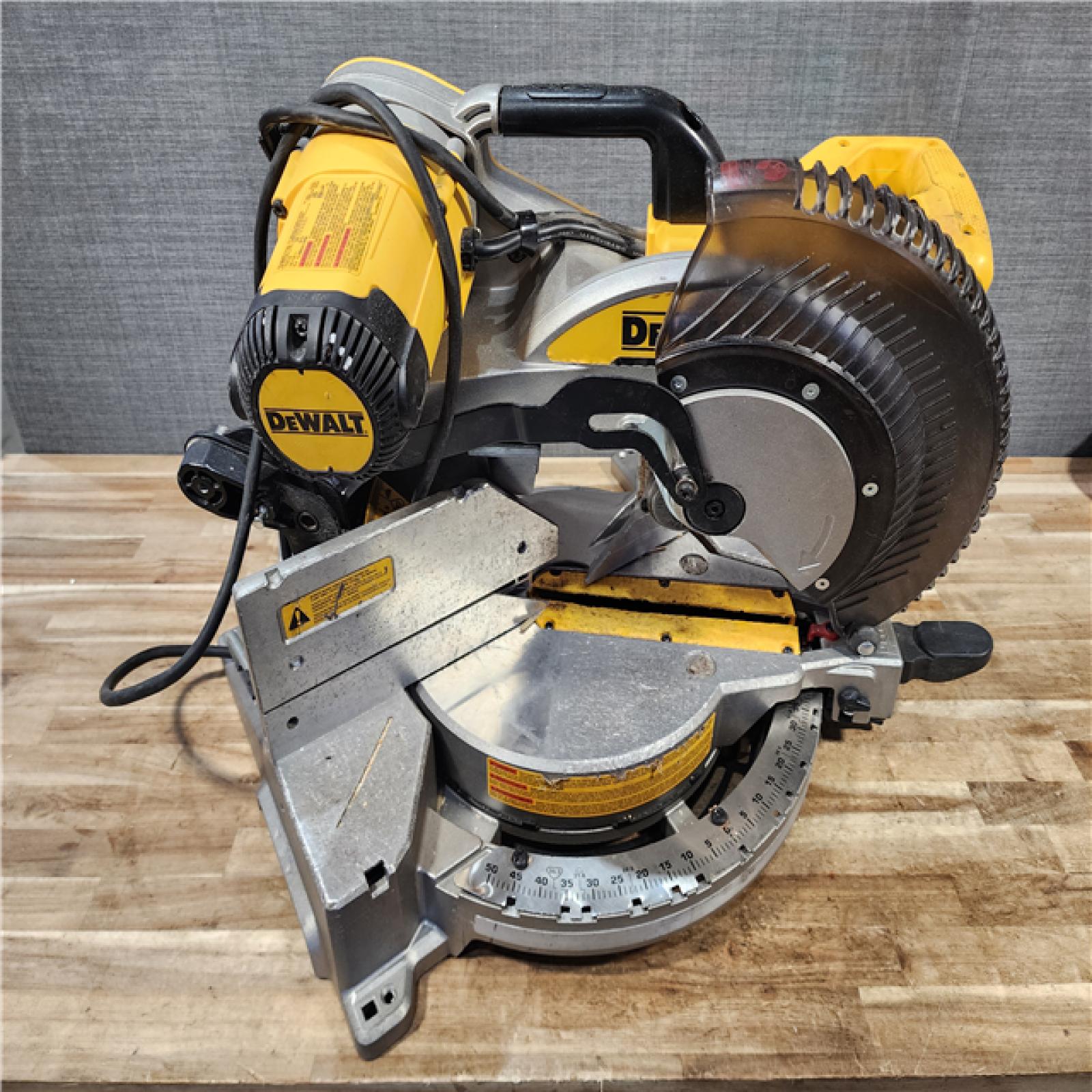 HOUSTON LOCATION - AS - IS DEWALT 15 Amp Corded 12 in. Double Bevel Sliding Compound Miter Saw