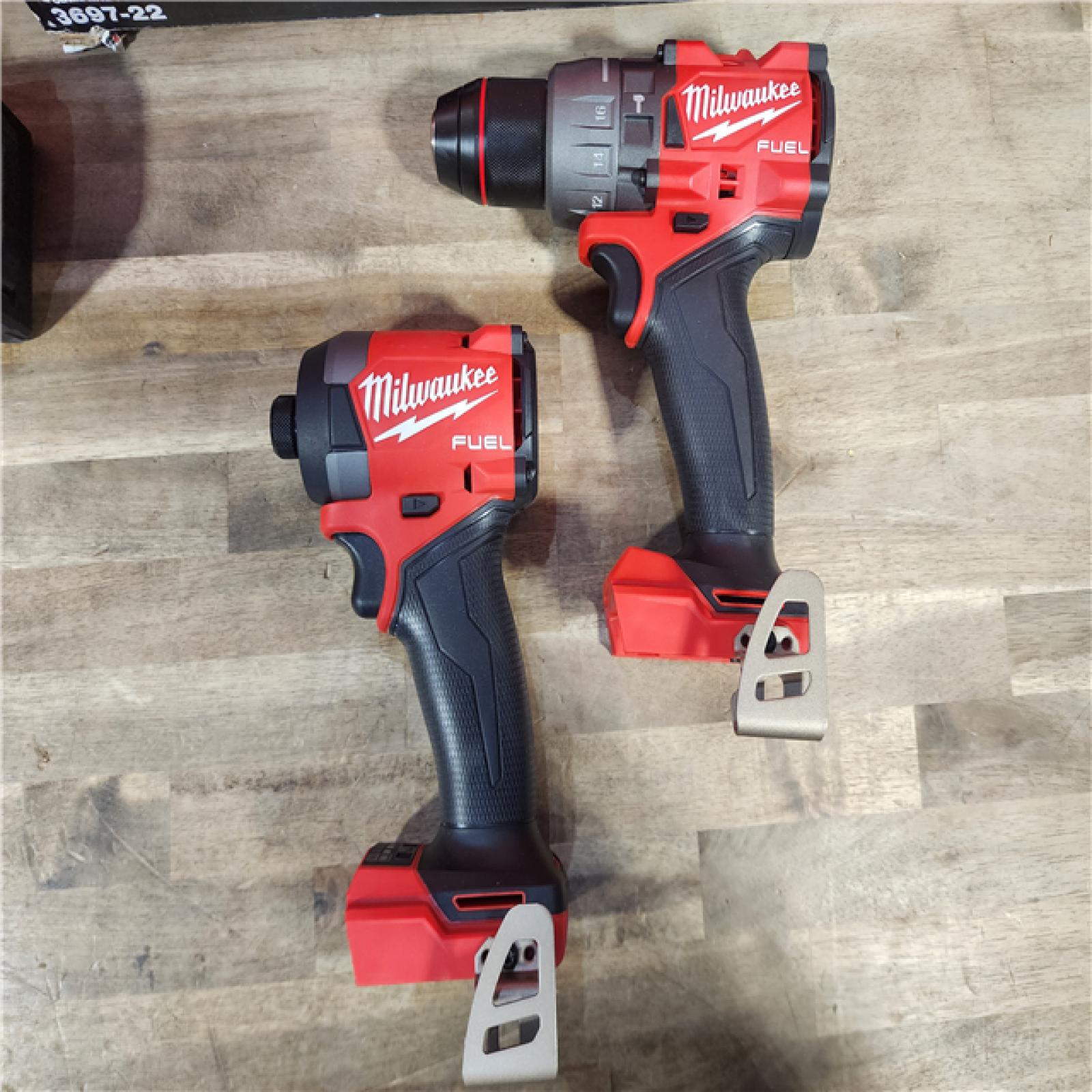 HOUSTON LOCATION - AS-IS (APPEARS LIKE NEW) MILWAUKEE M18 FUEL 18V Lithium-Ion Brushless Cordless Hammer Drill and Impact Driver Combo Kit (2-Tool) with 2 Batteries