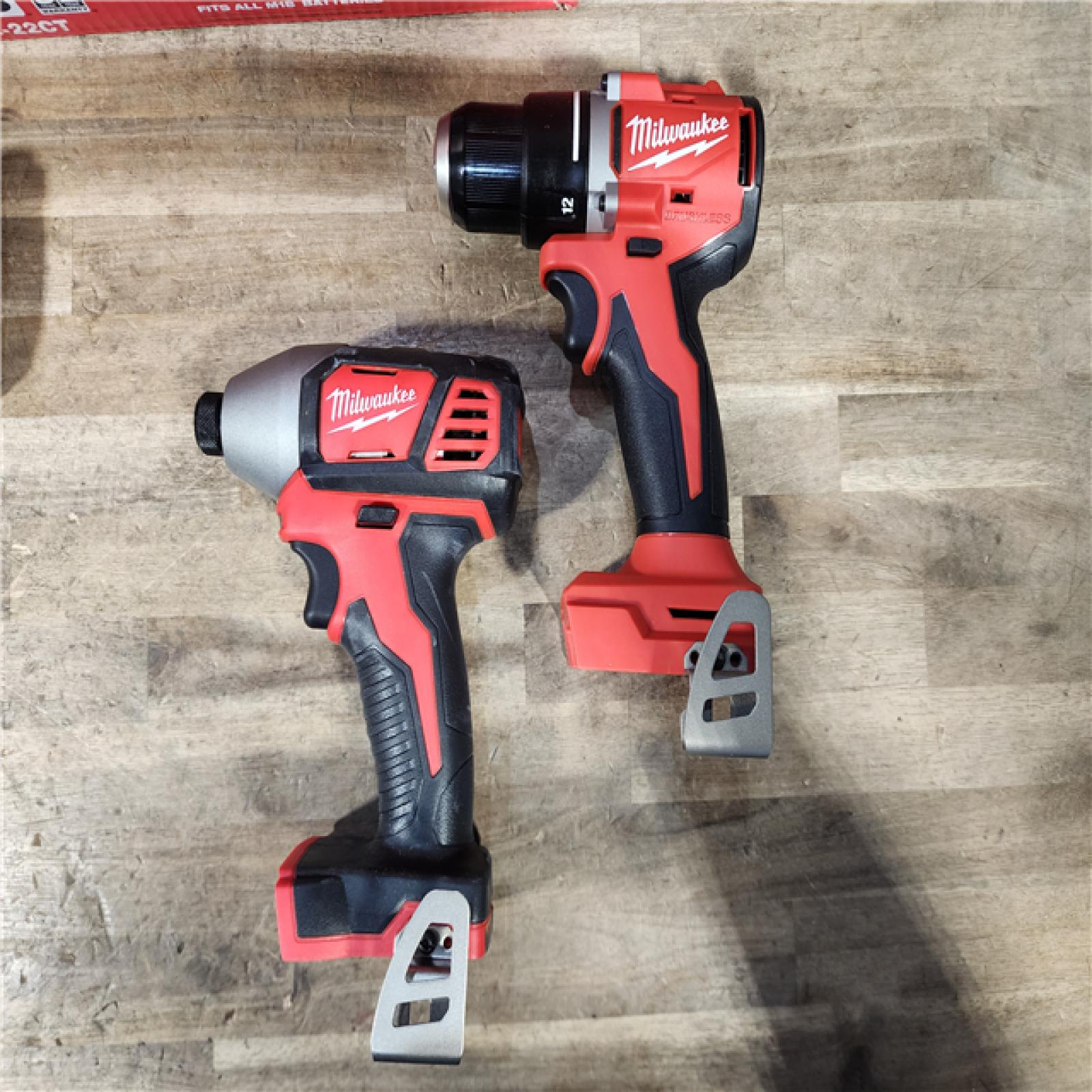 HOUSTON LOCATION - AS-IS Milwaukee M18 18V Lithium-Ion Brushless Cordless Compact Drill/Impact Combo Kit (2-Tool) W/(2) 2.0 Ah Batteries  Charger & Bag