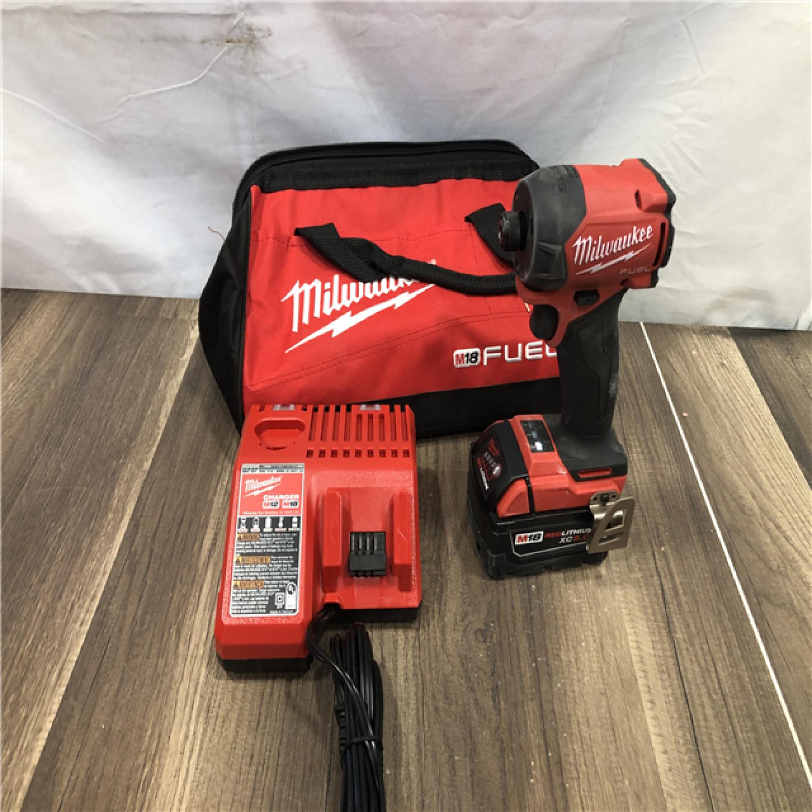 AS-IS Milwaukee FUEL SURGE 18V Lithium-Ion Brushless Cordless 1/4 in. Hex Impact Driver Kit