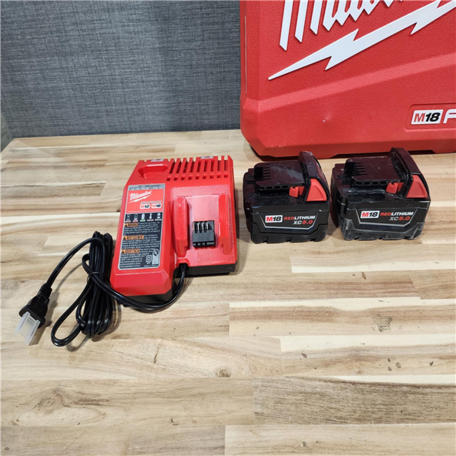 HOUSTON LOCATION - AS-IS Milwaukee  FUEL 18V Lithium-Ion Brushless Cordless Hammer Drill and Impact Driver Combo Kit