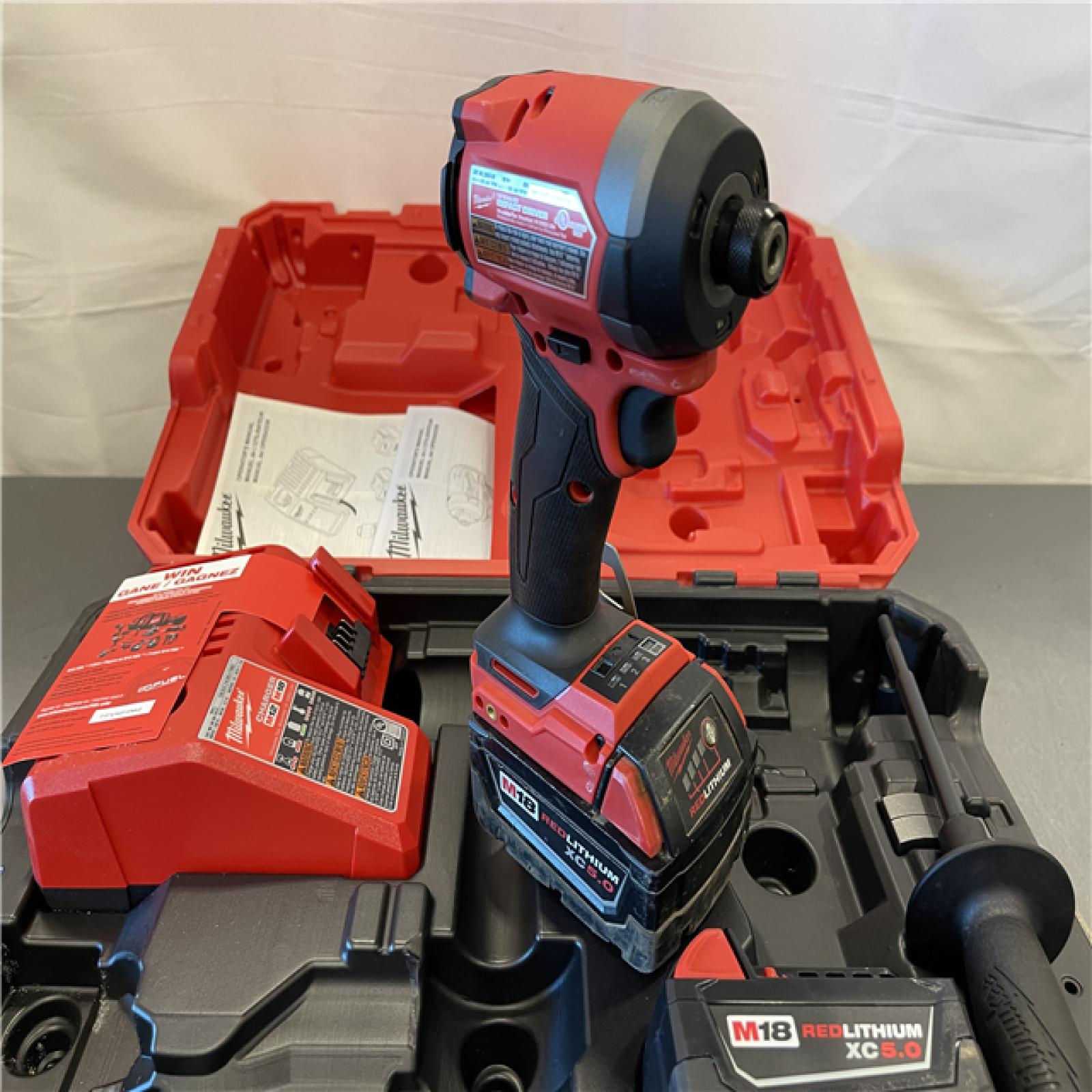 AS-IS - Milwaukee M18 FUEL 18V Lith-Ion Brushless Cordless 1/4 in. Hex Impact Driver Kit