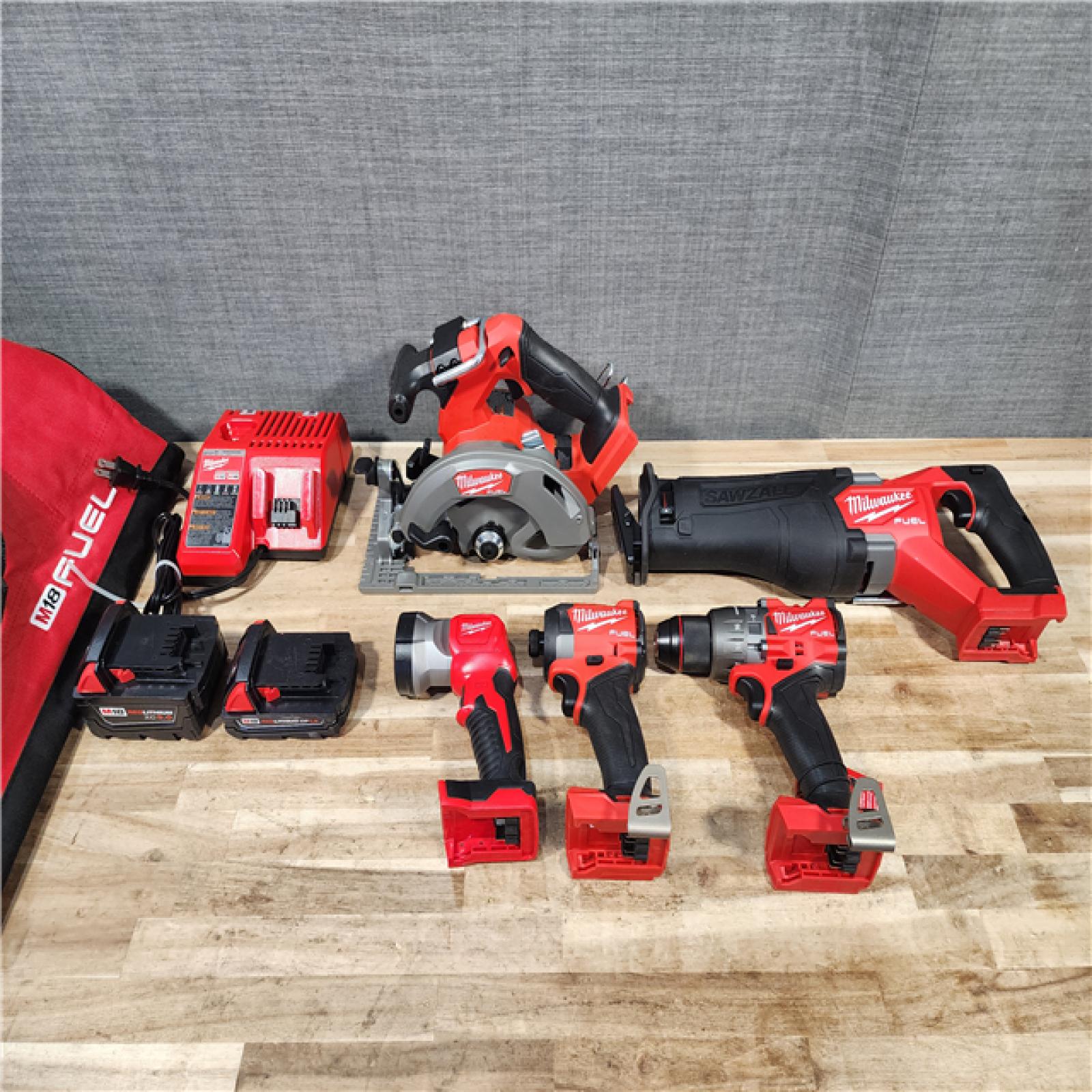 HOUSTON LOCATION - AS-IS Milwaukee 5 Tool Combo Kit W/ (2) Battery & Charger