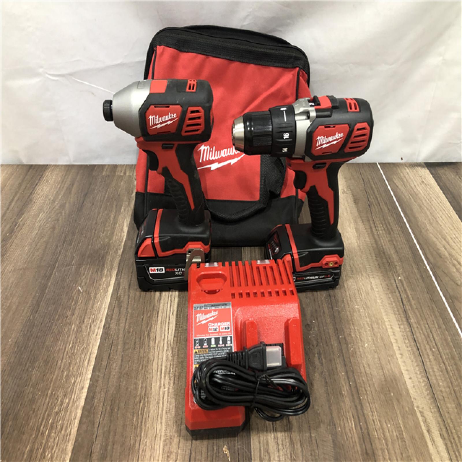 AS-IS Milwaukee M18 18V Lithium-Ion Cordless Drill Driver/Impact Driver Combo Kit