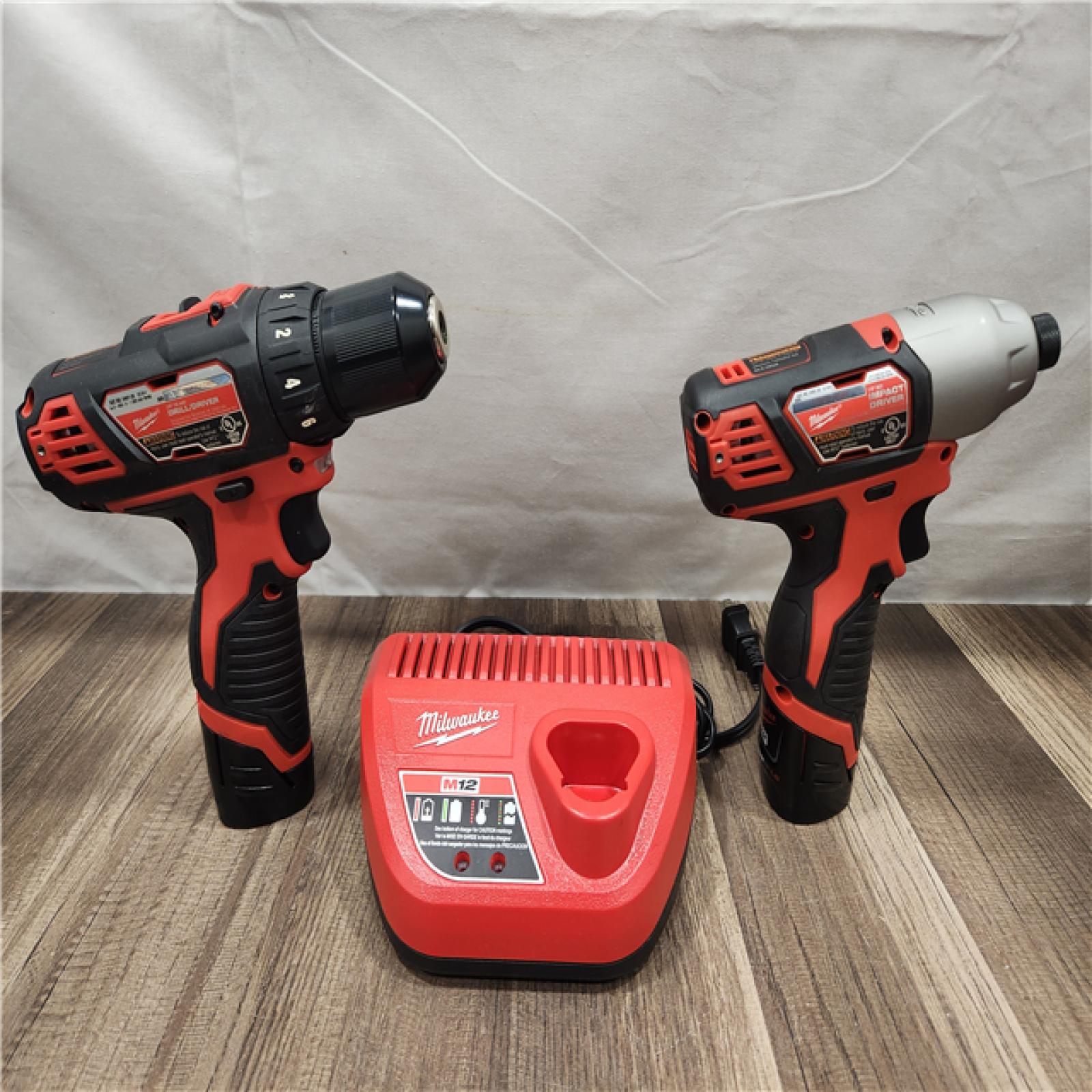 AS-IS- Milwaukee M12 Cordless Combination 3/8 Drill / Driver and 1/4 Hex Impact Driver Dual Power Tool Kit (2 Lithium Ion Batteries  Charger  and B