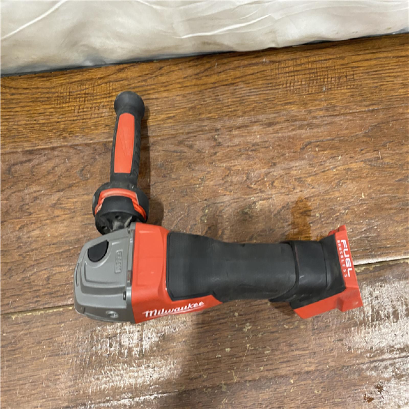AS-IS Milwaukee 2880-20 M18 FUEL 18-Volt Lithium-Ion Brushless Cordless 4-1/2 in./5 in. Grinder W/Paddle Switch (Tool-Only)