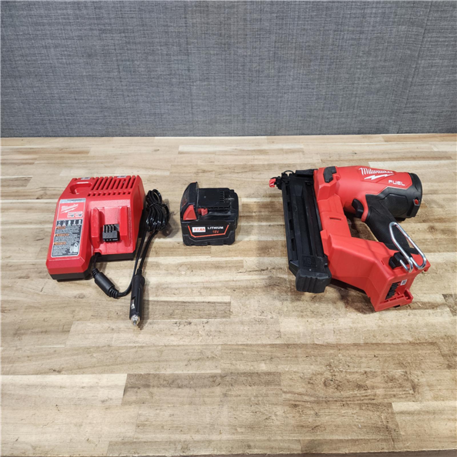 HOUSTON LOCATION - AS - IS Milwaukee FUEL 18-Volt Lithium-Ion Brushless Cordless Gen II 18-Gauge Brad Nailer W/ BATTERY & CHARGER