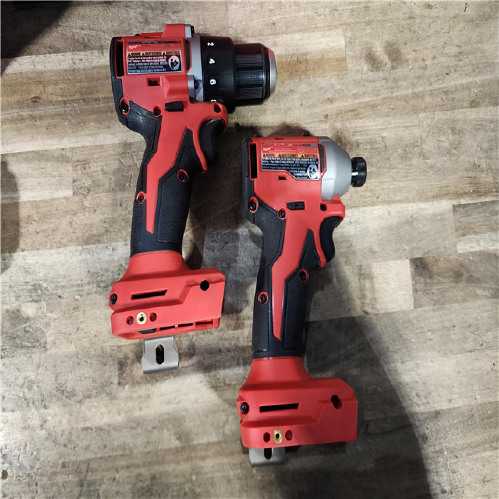 HOUSTON LOCATION - AS-IS Milwaukee M18 18V Lithium-Ion Brushless Cordless Compact Drill/Impact Combo Kit (2-Tool) W/(2) 2.0 Ah Batteries  Charger & Bag