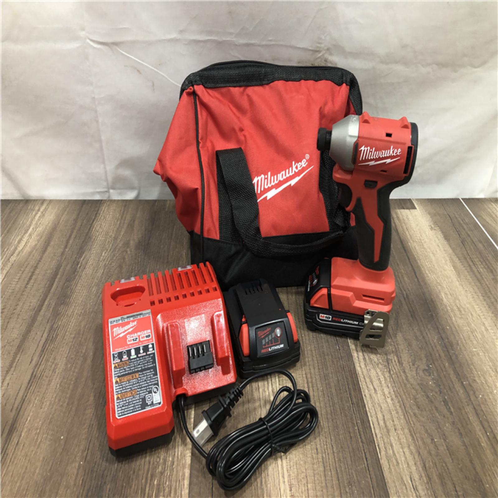 AS-IS Milwaukee 18V Lithium-Ion Brushless Cordless 1/4 in. Impact Driver Kit