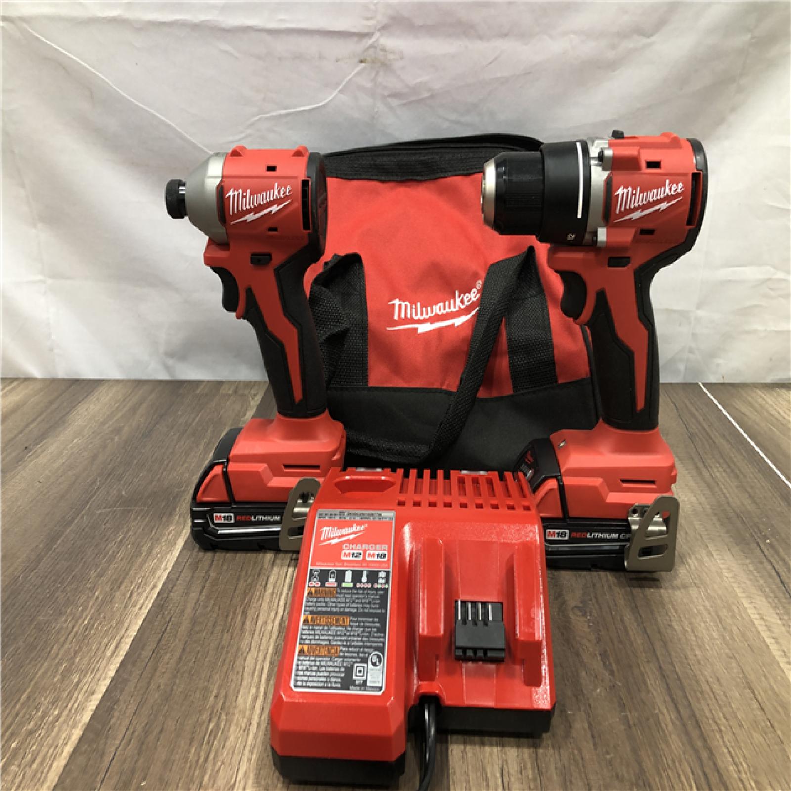 AS-IS Milwaukee 18V Lithium-Ion Brushless Cordless Compact Drill/Impact Combo Kit