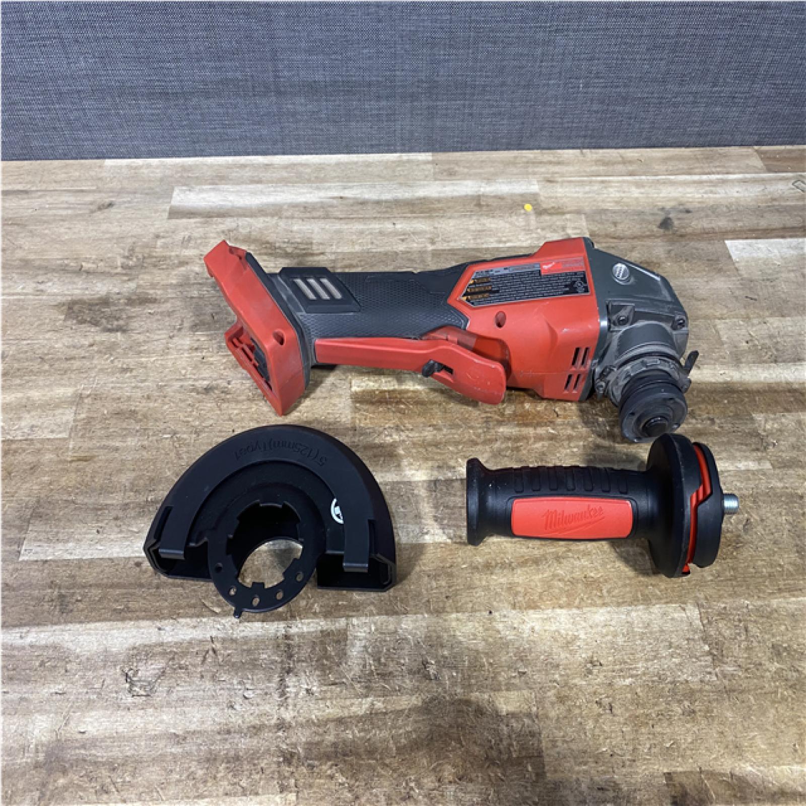 Houston Location AS-IS Milwaukee FUEL 18V Lithium-Ion Brushless Cordless 4-1/2 in./5 in. Grinder with Variable Speed & Paddle Switch (Tool-Only)
