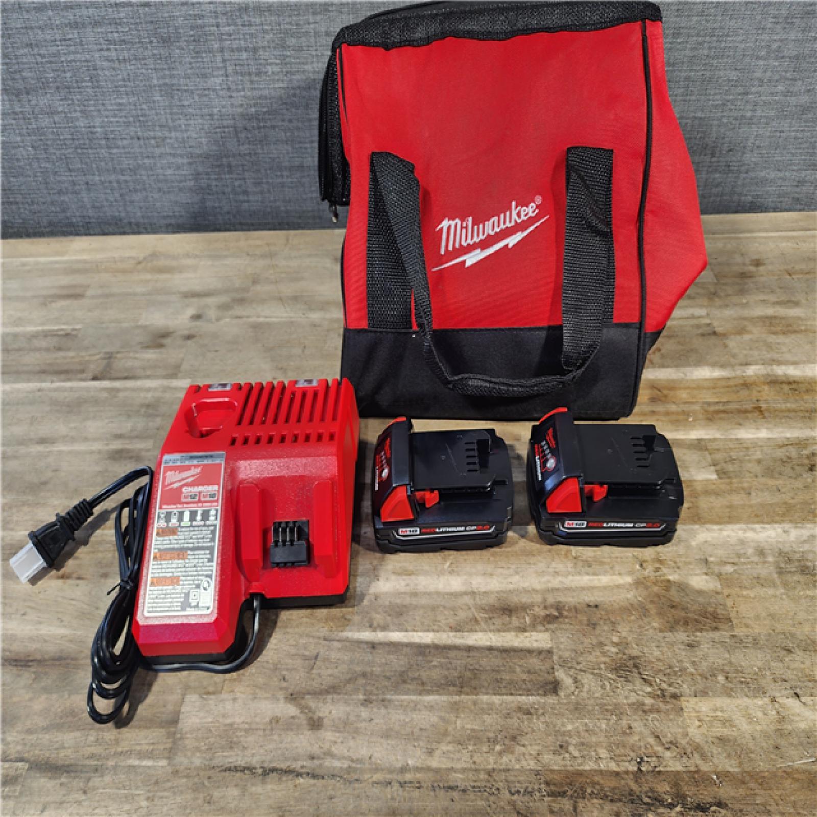 HOUSTON LOCATION - AS-IS M18 18-Volt Lithium-Ion Brushless Cordless Compact Hammer Drill/Impact Combo Kit (2-Tool) with (2) Batteries, Bag