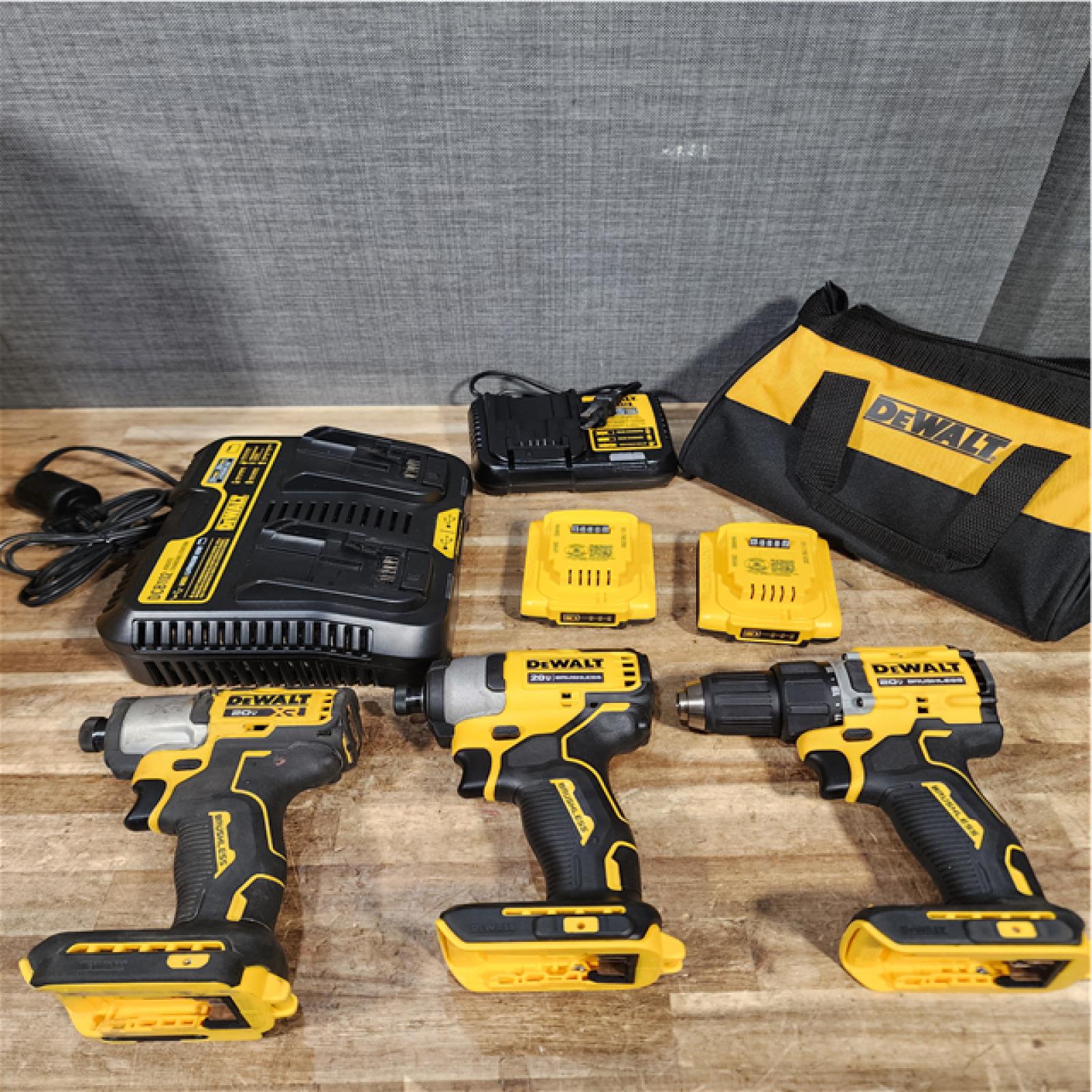Houston Location AS-IS DEWALT Drill and Impacts QTY/2 and Batteries and Dual port Charger with Charger