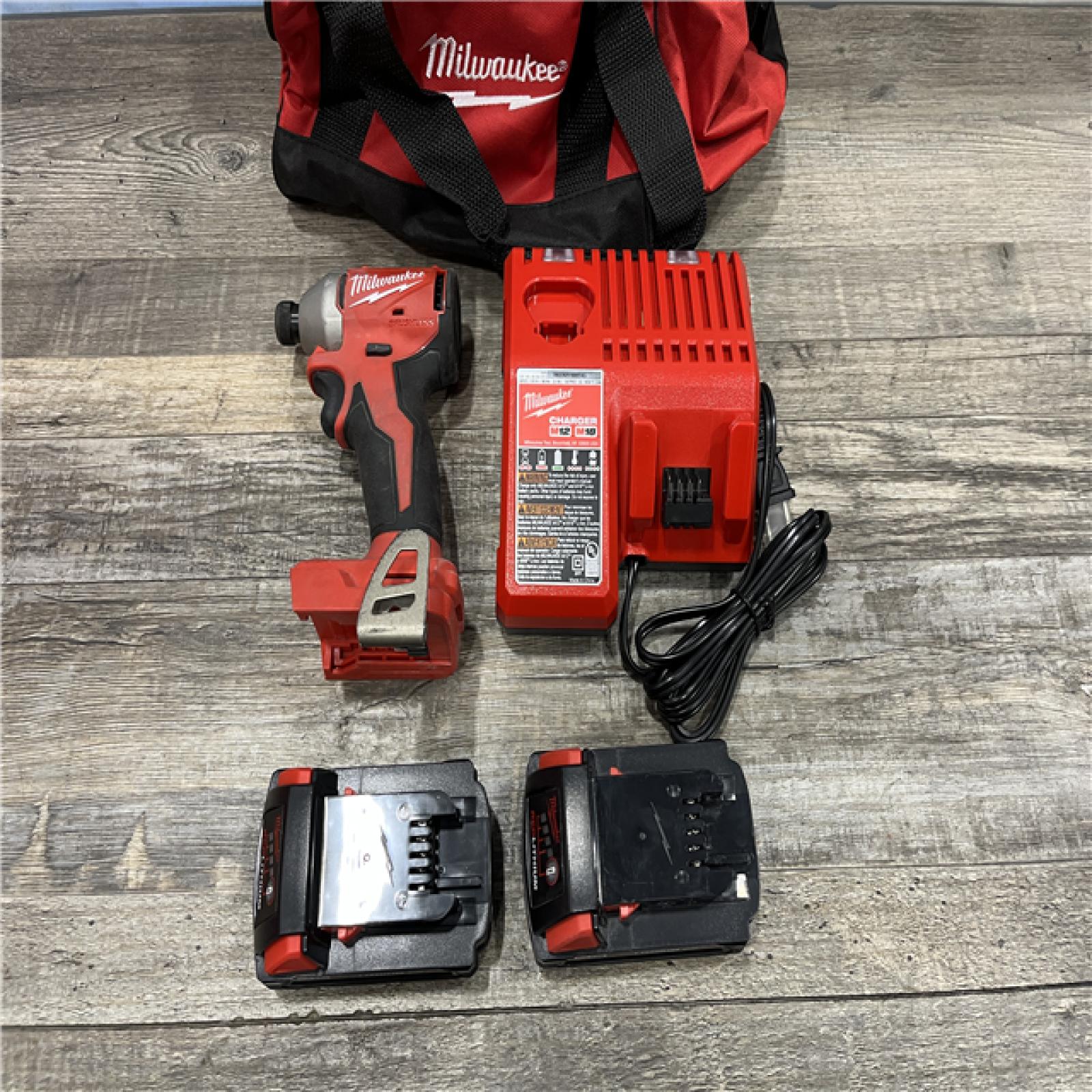 AS-IS Milwaukee 18V Lithium-Ion Brushless Cordless 1/4 in. Impact Driver Kit