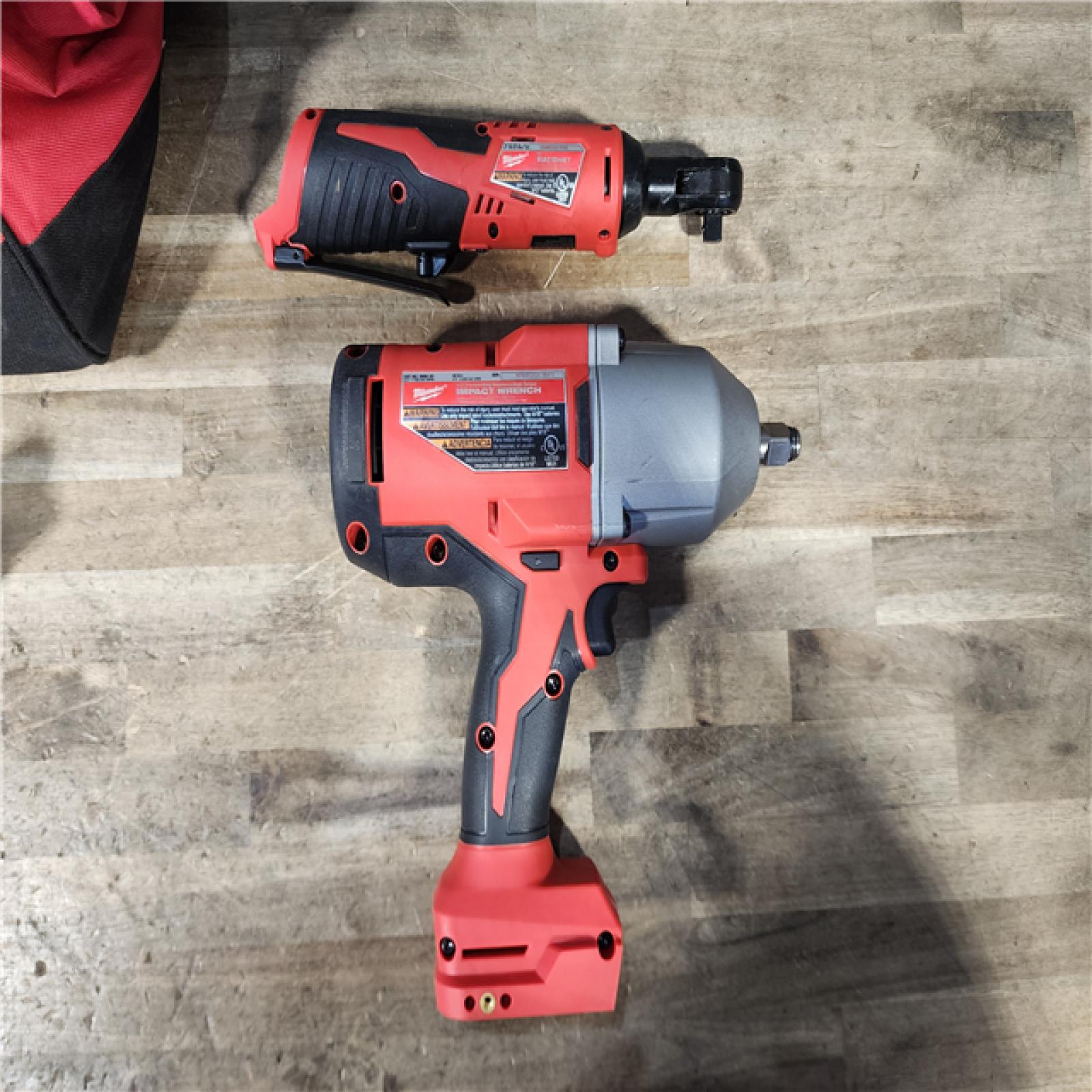 HOUSTON LOCATION - AS-IS Milwaukee 12/18V Lithium-Ion Cordless 3/8 in. Ratchet and 1/2 in. High Torque Impact Wrench with Friction Ring Combo Kit