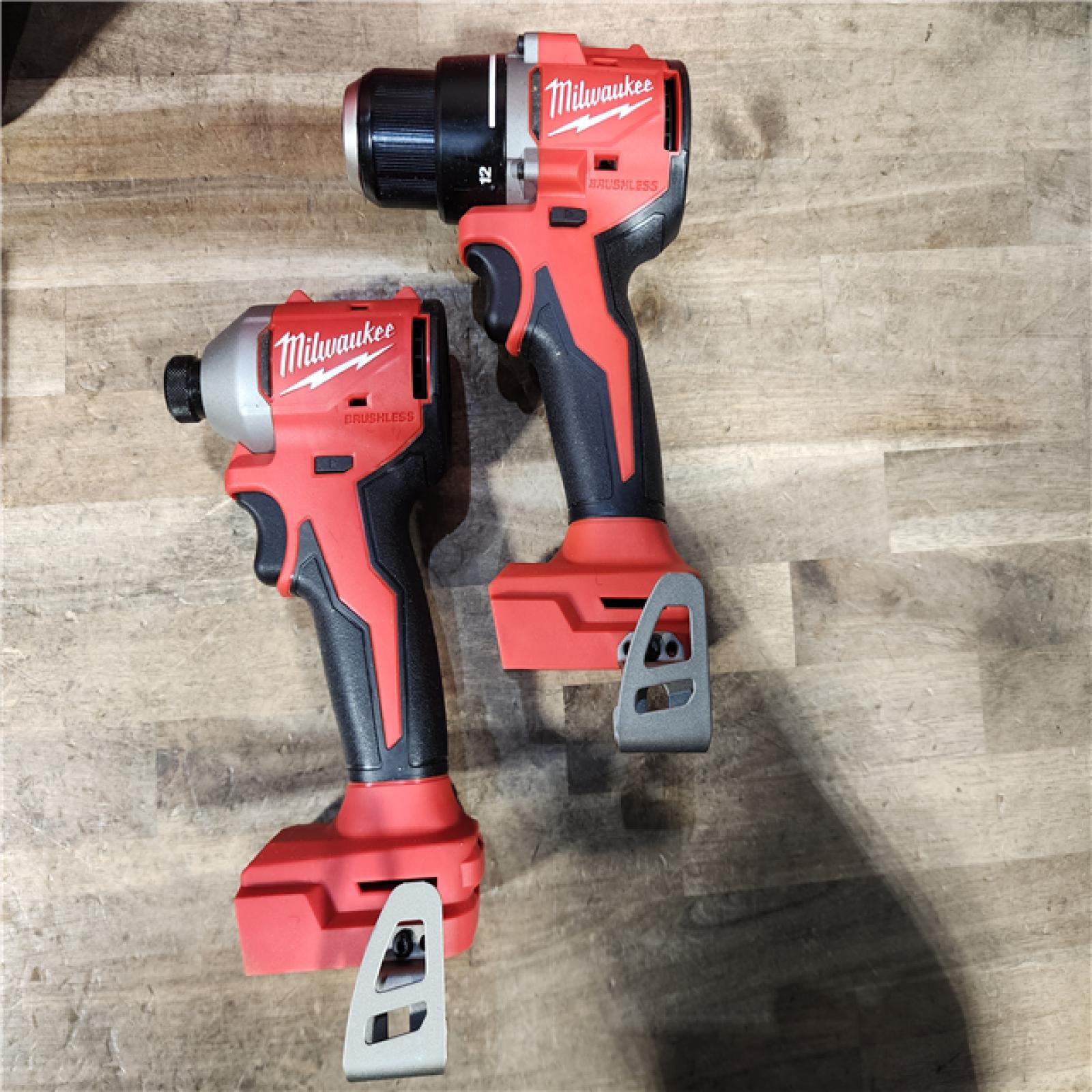 HOUSTON LOCATION - AS-IS Milwaukee M18 18V Lithium-Ion Brushless Cordless Compact Drill/Impact Combo Kit (2-Tool) W/(2) 2.0 Ah Batteries  Charger & Bag