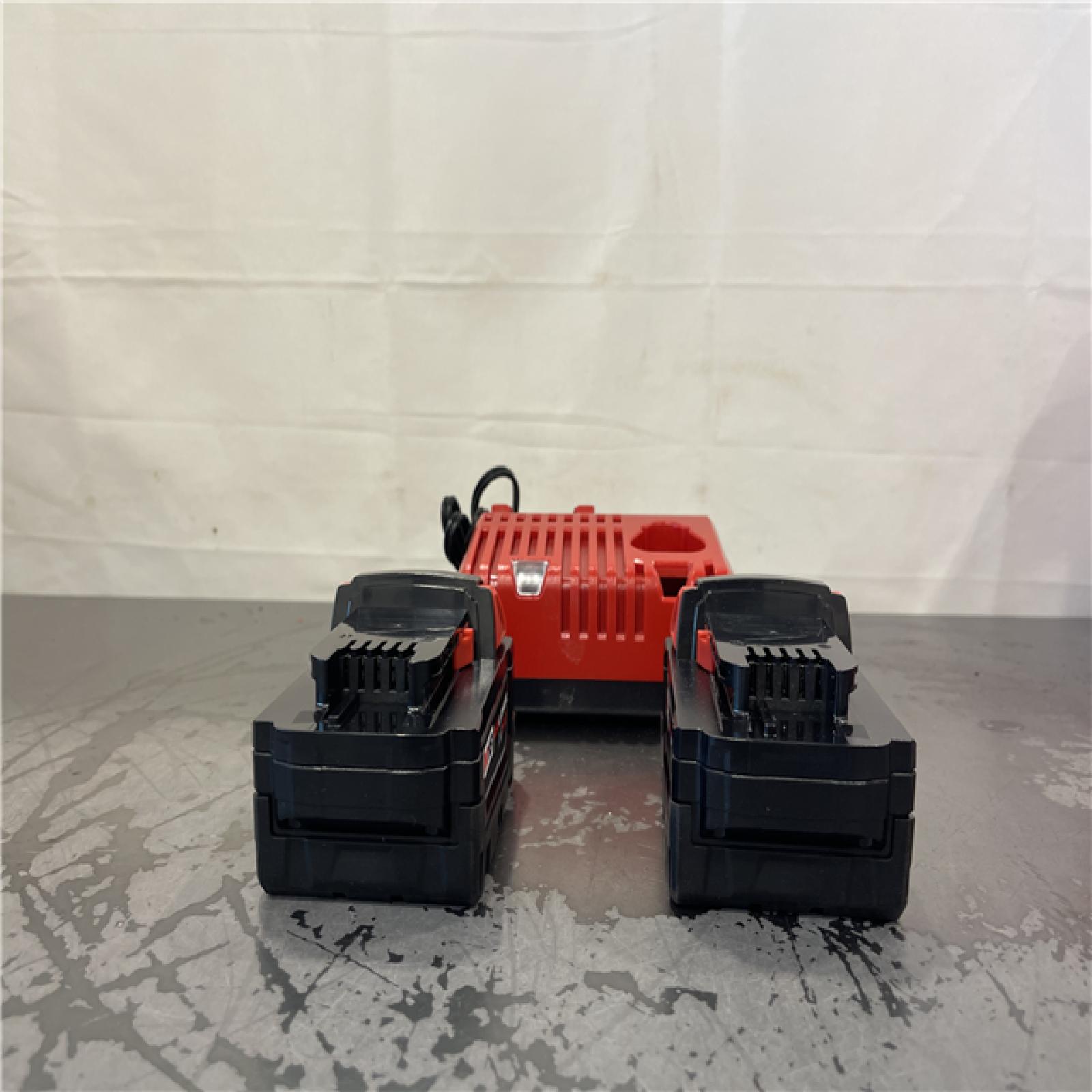 AS-IS- Milwaukee M18 18-Volt Lithium-Ion XC Starter Kit with Two 5.0Ah Batteries and Charger