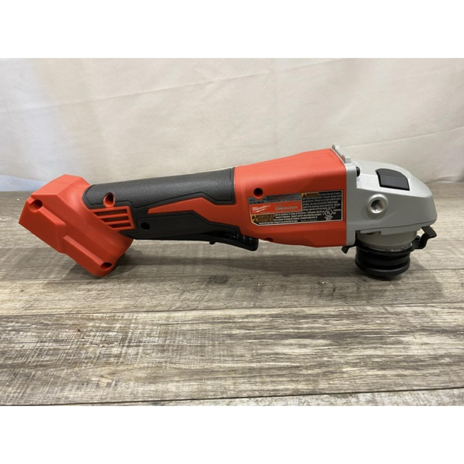 AS-IS Milwaukee 18V Lithium-Ion Brushless Cordless 4-1/2 in./5 in. Grinder w/Paddle Switch (Tool-Only)