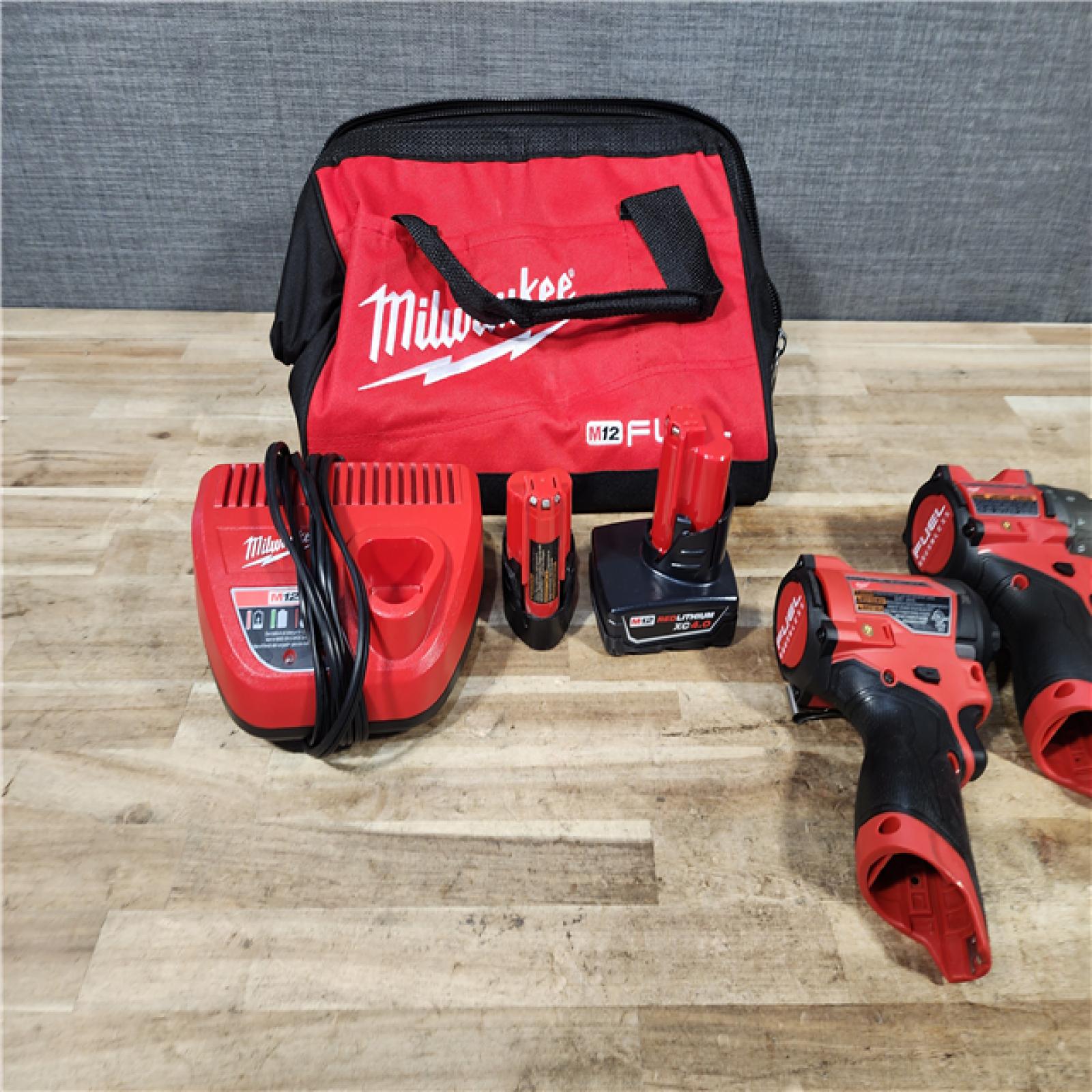 HOUSTON LOCATION - AS - IS Milwaukee FUEL 12-Volt Lithium-Ion Brushless Cordless Hammer Drill and Impact Driver Combo Kit