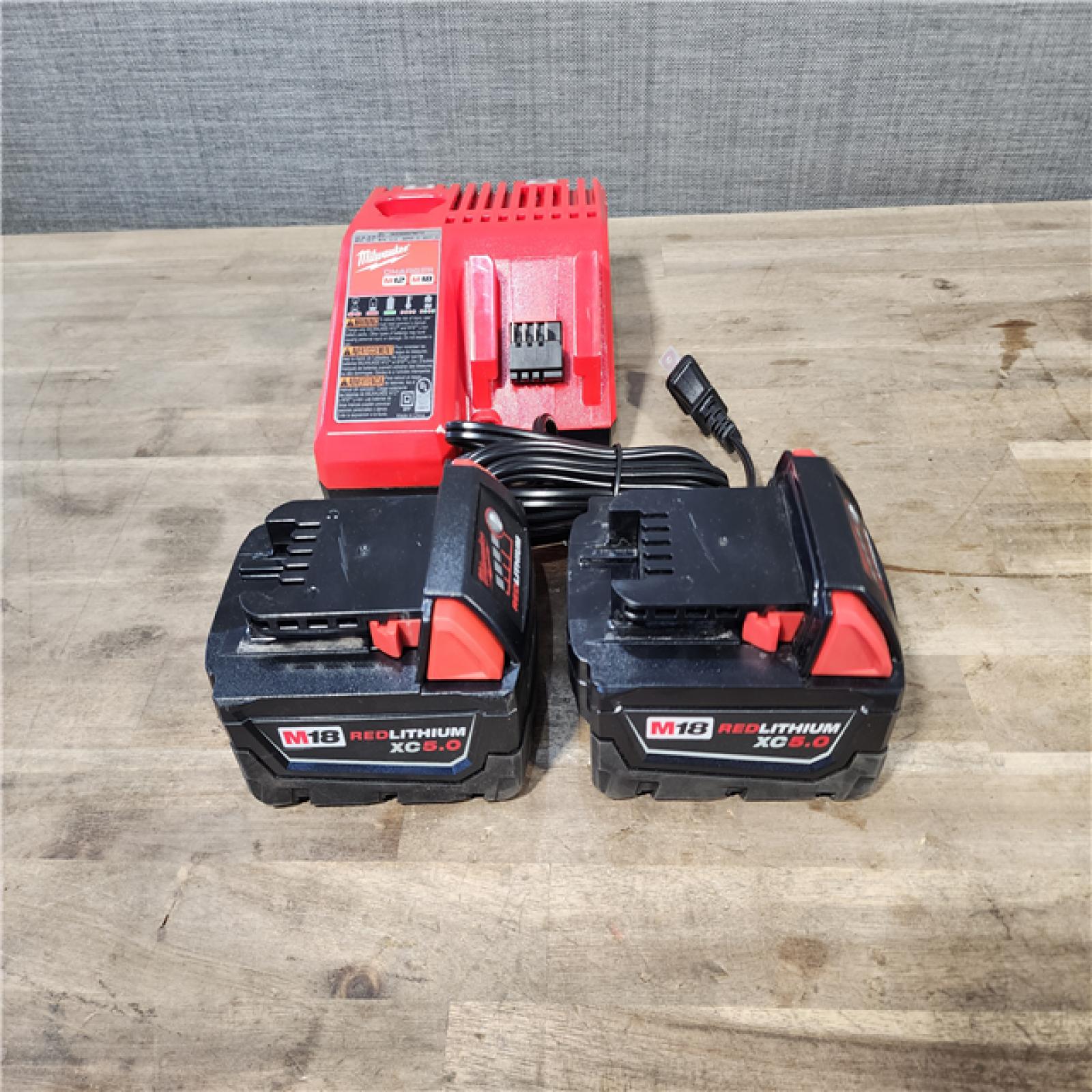 HOUSTON LOCATION - AS-IS MILWAUKEE 2 TOOL COMBO KIT W/ (2) BATTERY & CHARGER
