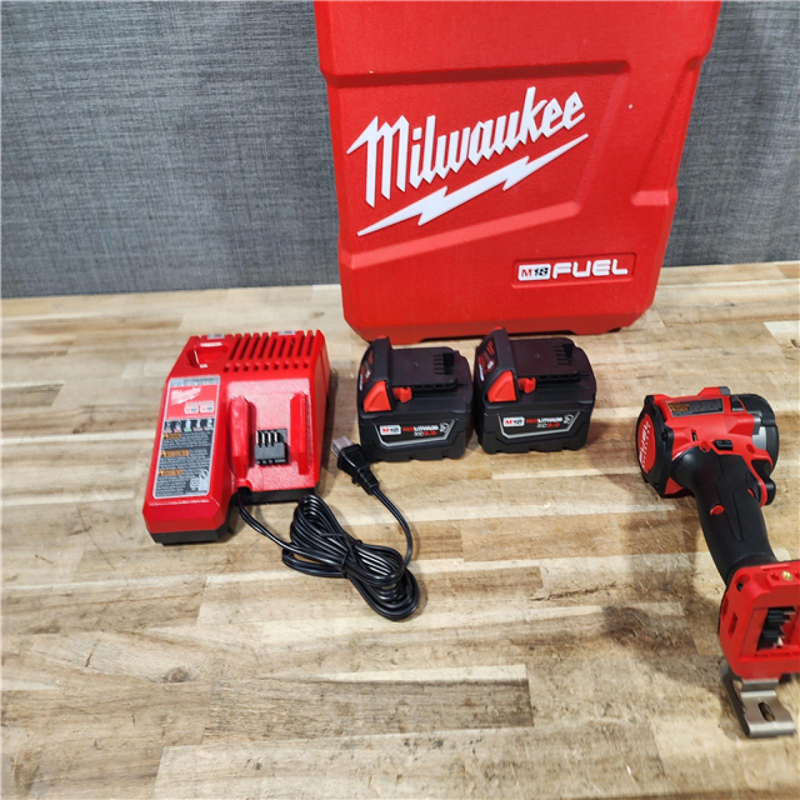 HOUSTON LOCATION - AS - IS Milwaukee FUEL 18V Lithium-Ion Brushless Cordless 3/8 in. Compact Impact Wrench Kit