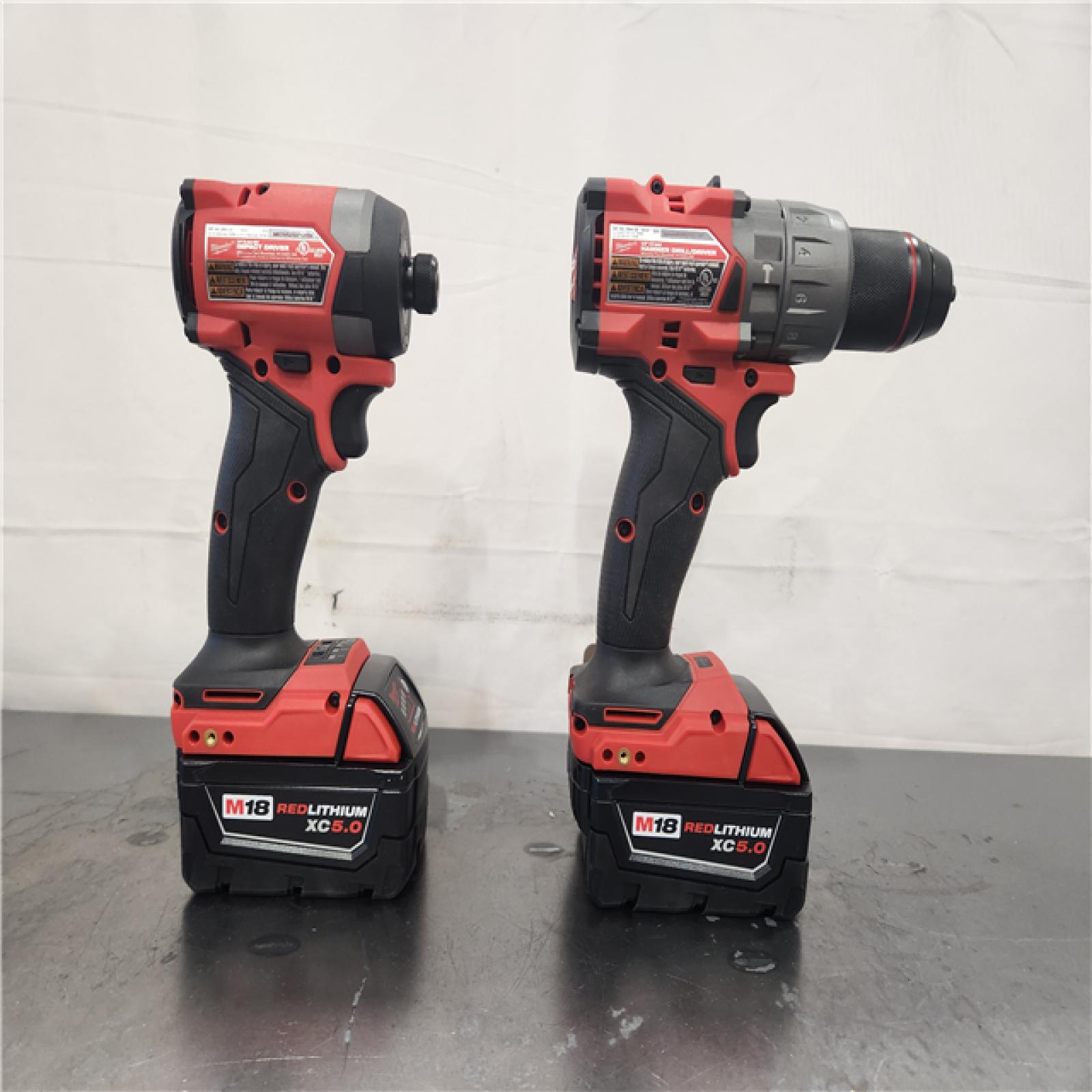 AS-IS- Milwaukee  FUEL 18V Lithium-Ion Brushless Cordless Hammer Drill and Impact Driver Combo Kit