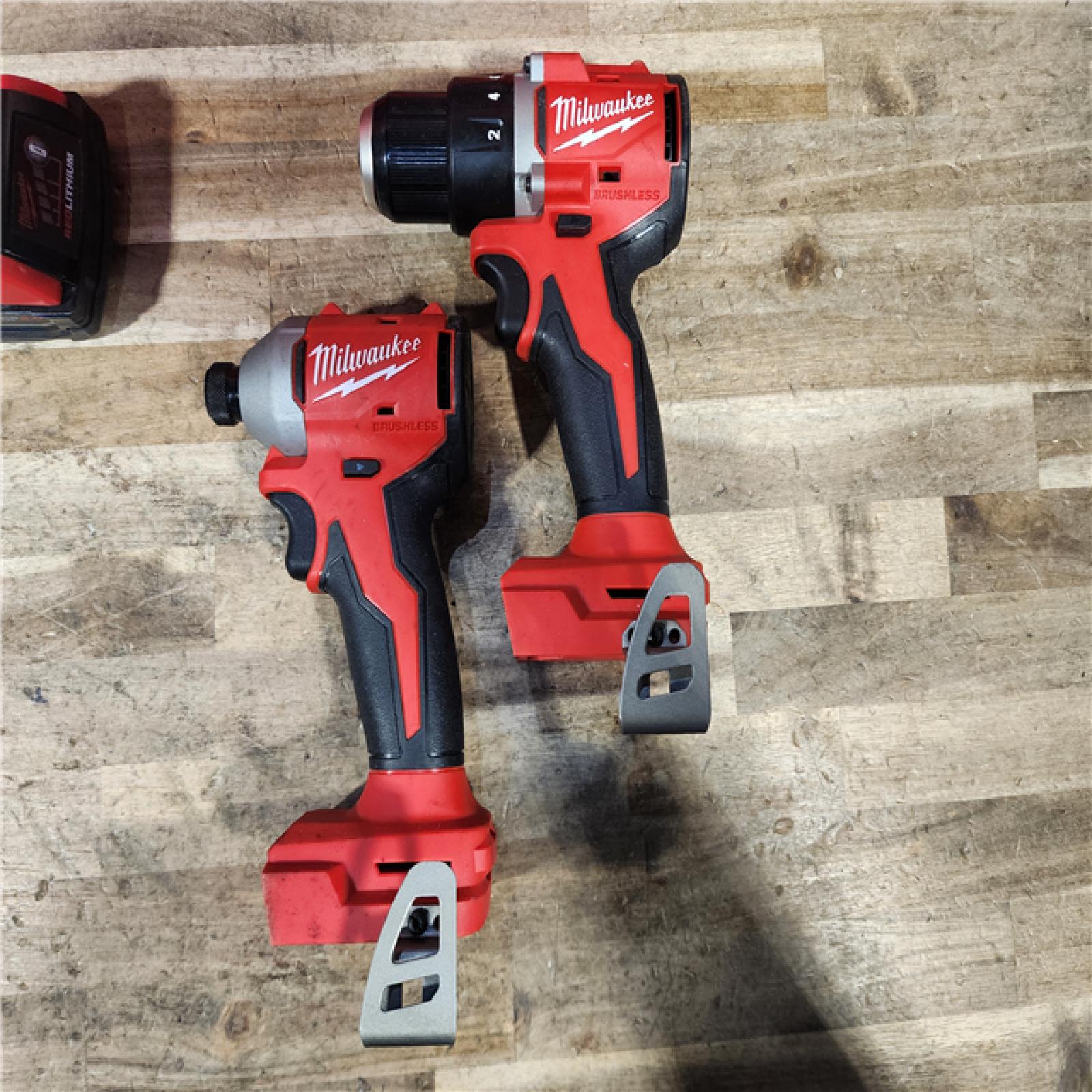 HOUSTON LOCATION - AS-IS Milwaukee M18 18V Lithium-Ion Brushless Cordless Compact Drill/Impact Combo Kit (2-Tool) W/(2) 2.0 Ah Batteries  Charger & Bag