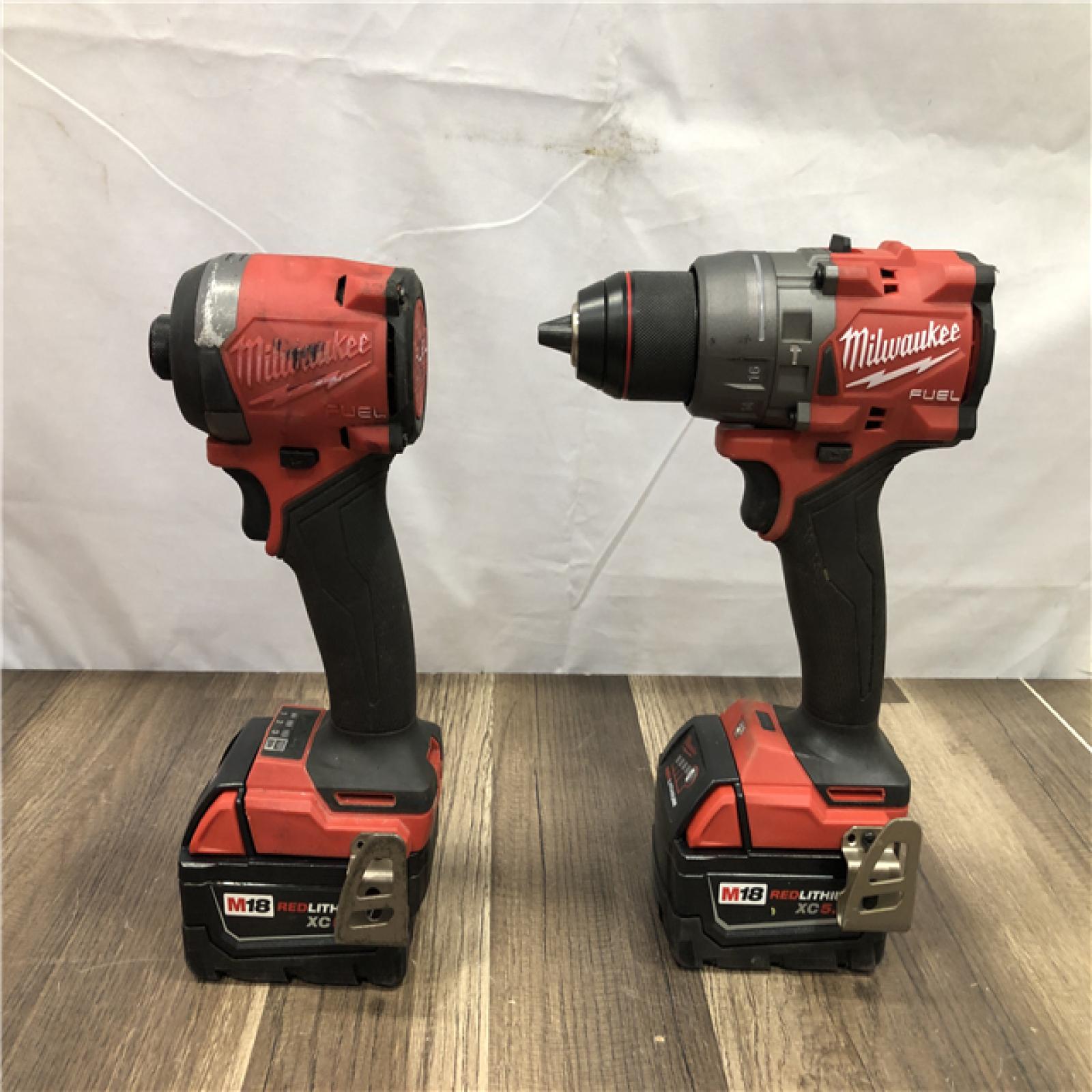 AS-IS Milwaukee  FUEL 18V Lithium-Ion Brushless Cordless Hammer Drill and Impact Driver Combo Kit