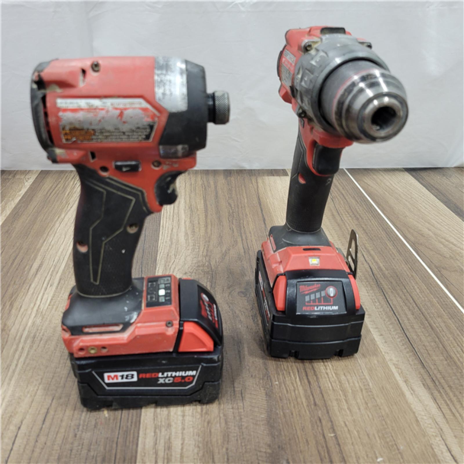 AS-IS  MILWAUKEE M18 FUEL 18V Lithium-Ion Brushless Cordless Hammer Drill and Impact Driver Combo Kit (2-Tool) with 2 Batteries