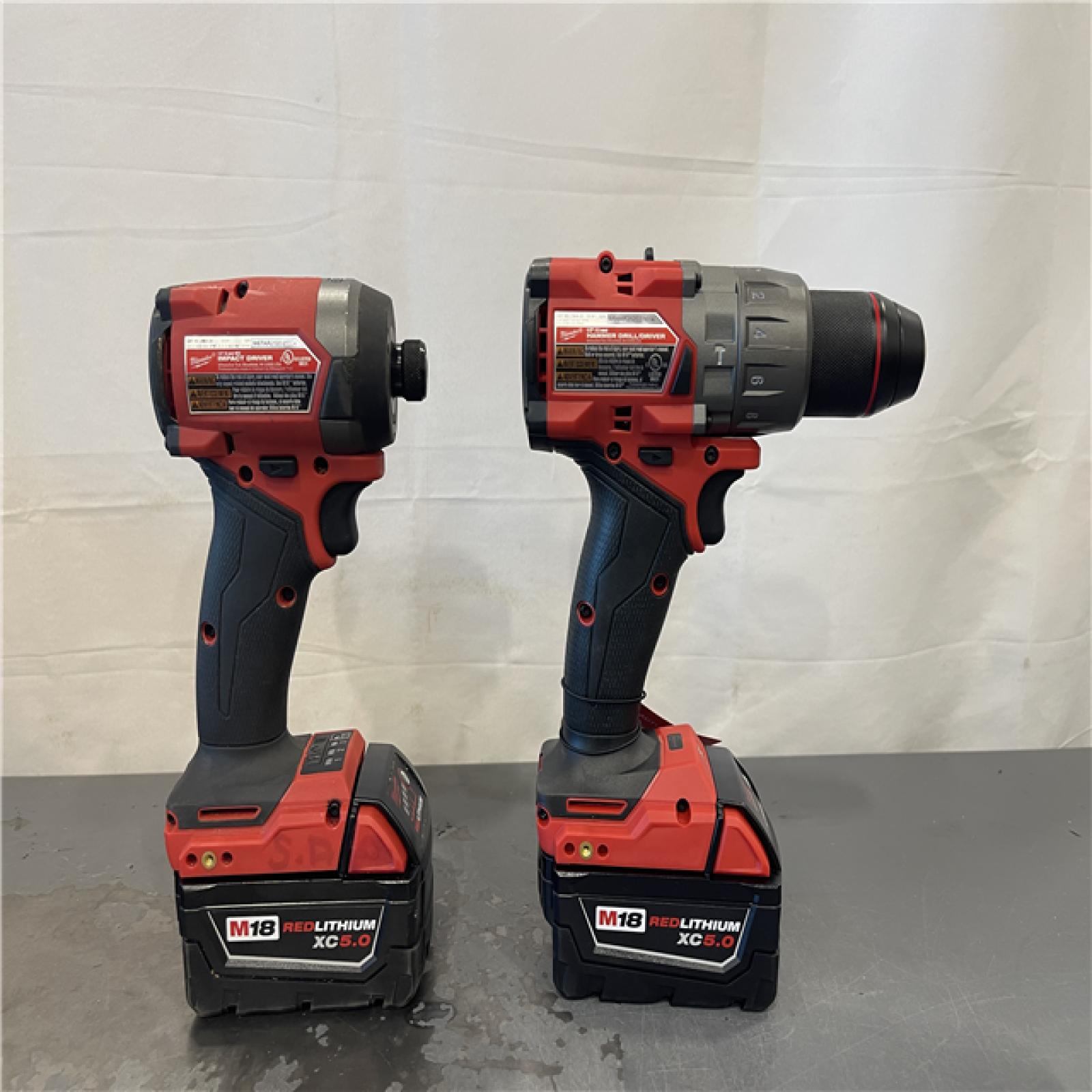 AS-IS- MILWAUKEE FUEL 18V Lithium-Ion Brushless Cordless Hammer Drill and Impact Driver Combo Kit