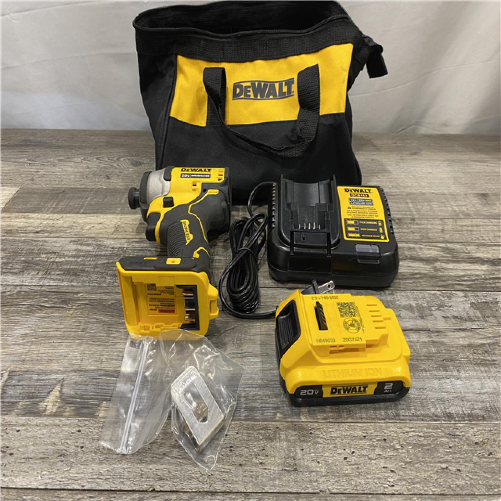 AS-IS DEWALT Atomic 20V Max Lithium-Ion Brushless Cordless Compact 1/4 in. Impact Driver Kit