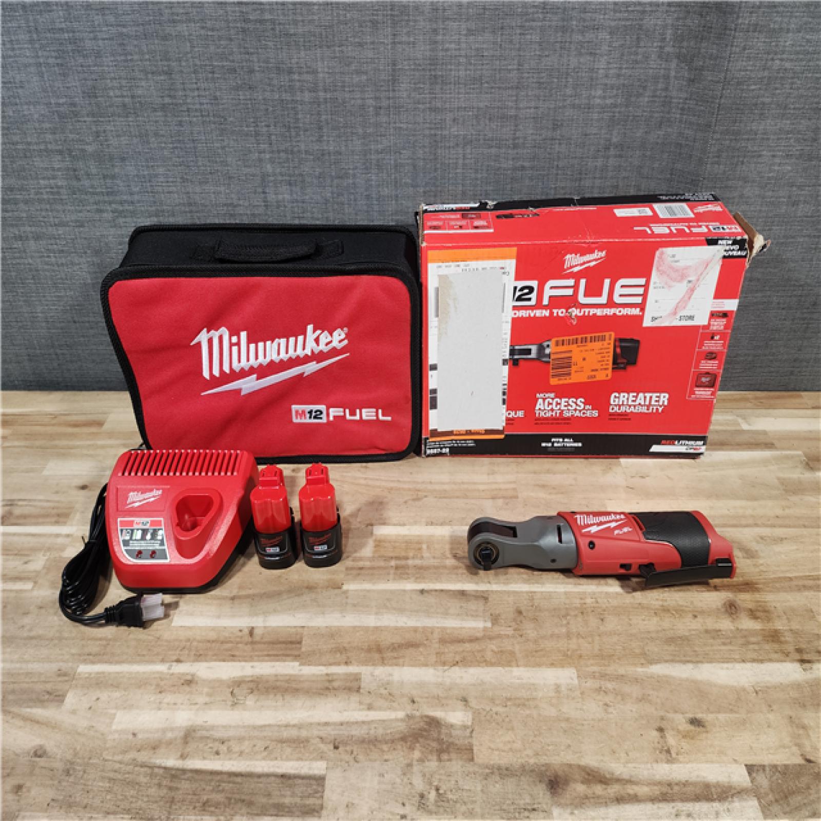 HOUSTON LOCATION - AS-IS (APPEARS LIKE NEW) Milwaukee M12 FUEL 12-Volt Lithium-Ion Brushless Cordless 3/8 in. Ratchet Kit with (2) 2.0Ah Batteries  Charger & Tool Bag